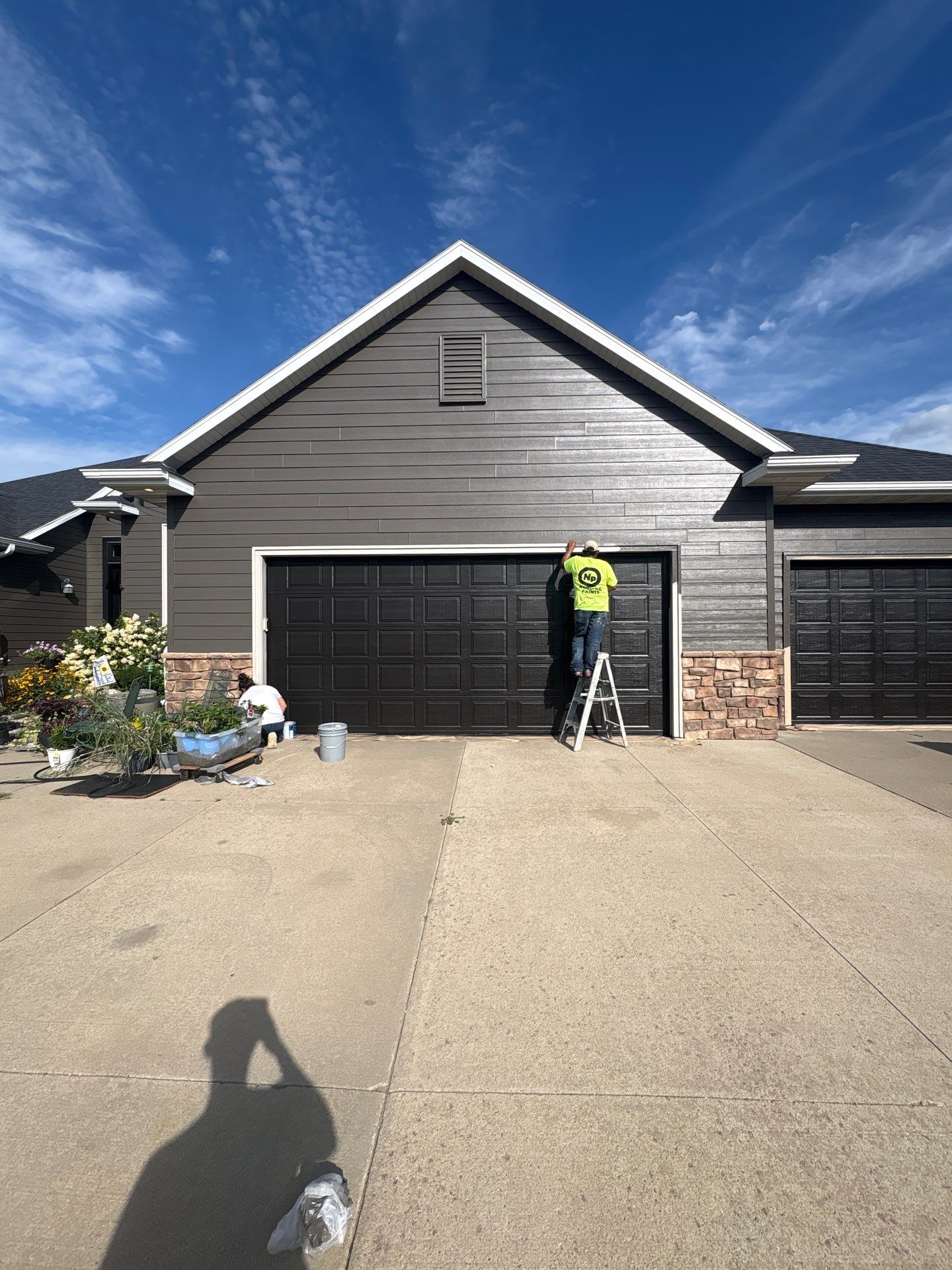 Sioux Falls Residential Exterior Painting and Siding Refresh by Select Painting, Coatings & Garage Cabinets