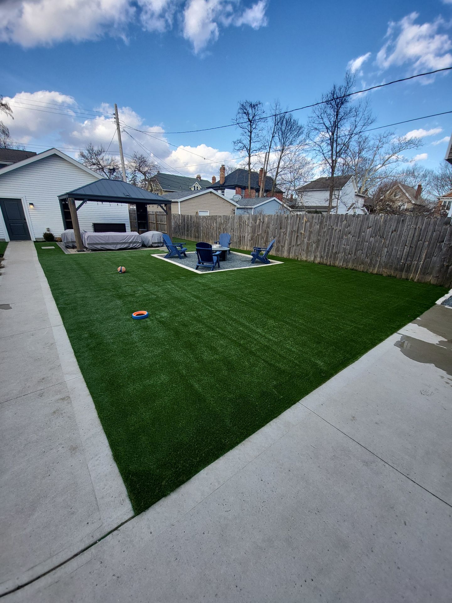 Full German Village Backyard  by Southwest Greens Midwest