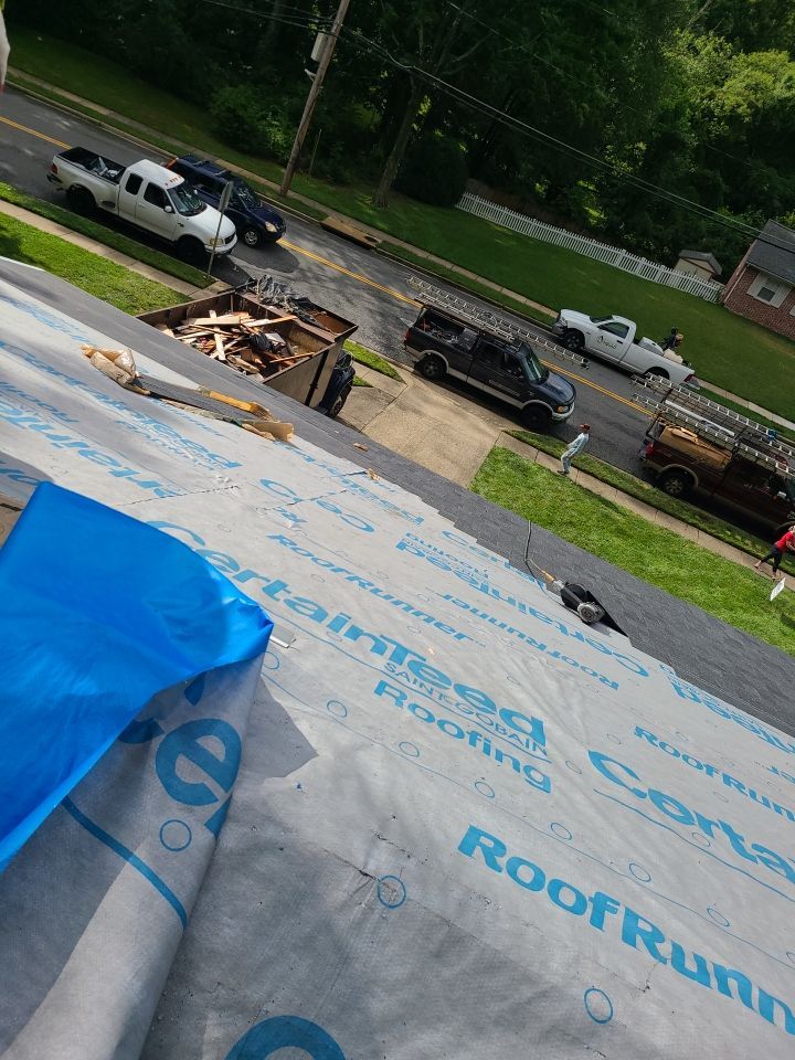 Springfield Tree Damage Restoration: CertainTeed Landmark Designer Shingles in Charcoal Black by RM Banning, Inc.