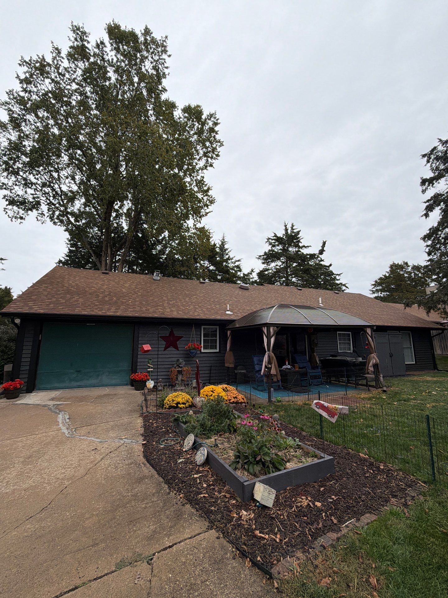 Wood siding refresh by Pezley Painting