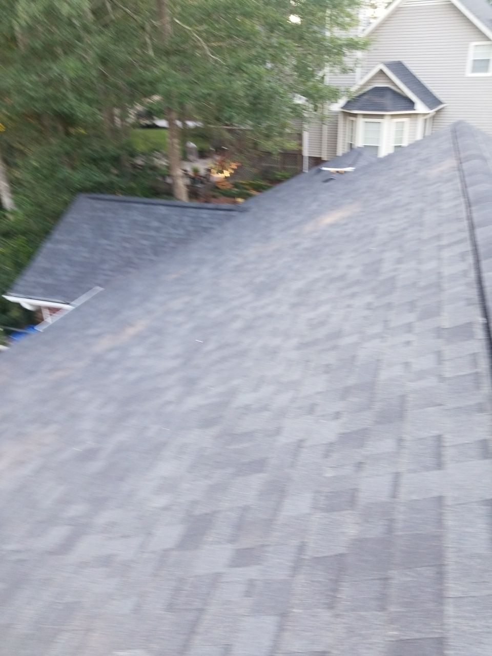 Residential Roofing Installation using Roof Replacement by American Roofing & Construction LLC