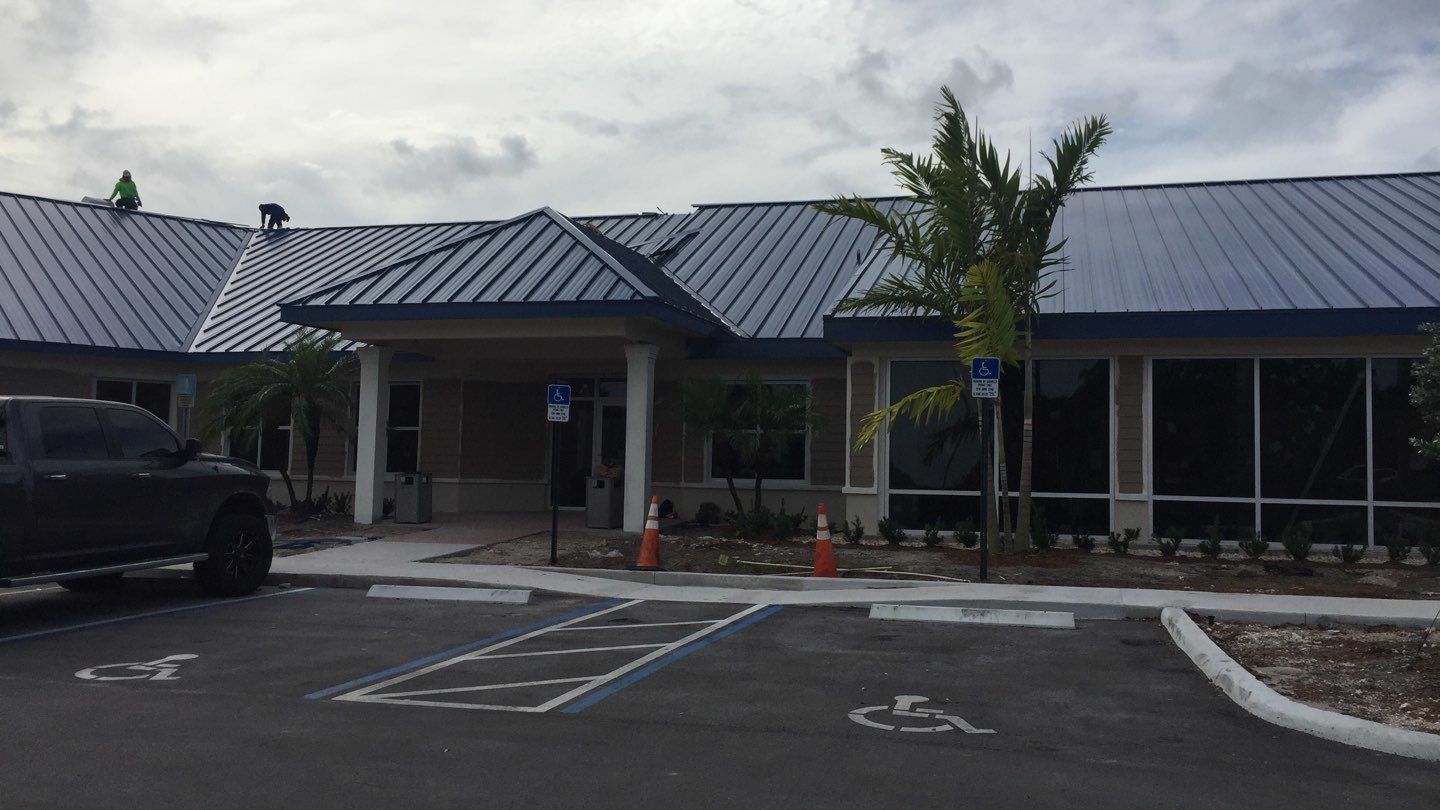 Residential Roofing Installation using 1.5'' Mechanical Seam by BLUES BROTHERS ROOFING