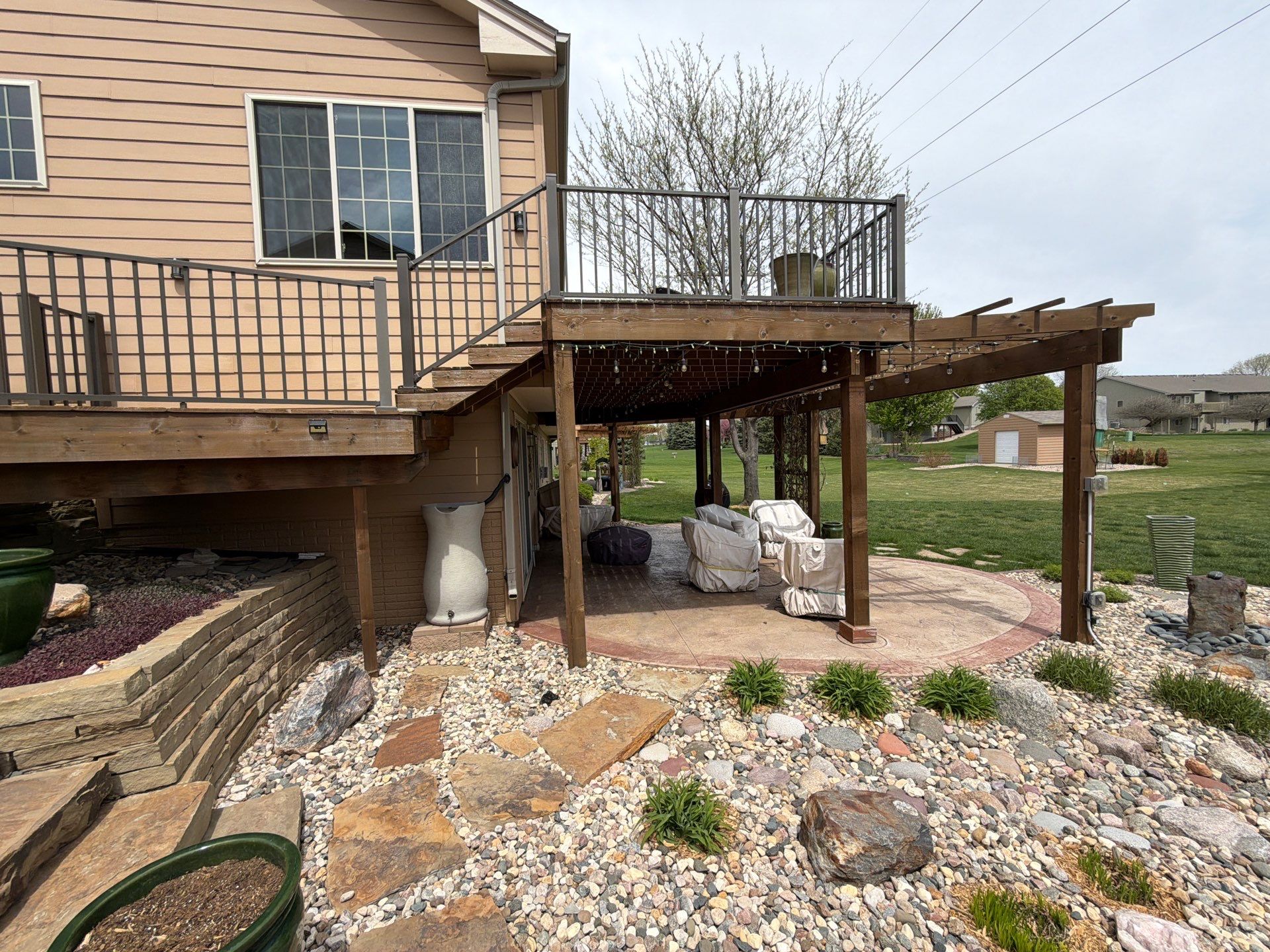 Tiered Wood Deck and Pergola Refinishing in Sioux Falls by Select Painting, Coatings & Garage Cabinets