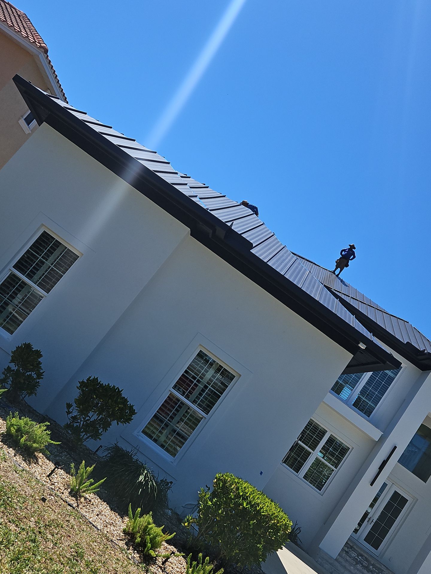 Soffit and Fascia Installation and black seamless gutters in Sarasota FL by Gutter Professors