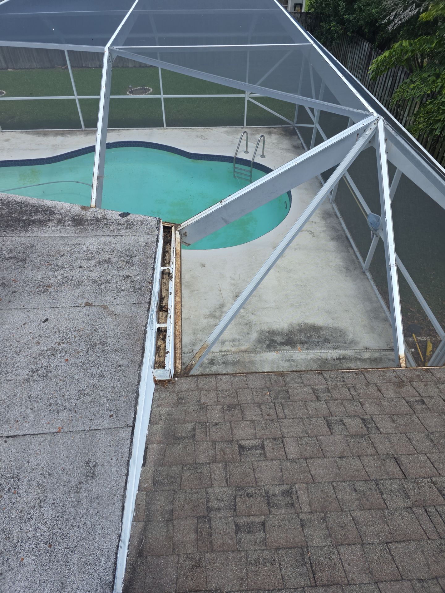 REPLACE NON APPROVED SKYLIGHT ALONG WITH CLOGED GUTTER by Morton Roofing, Inc.