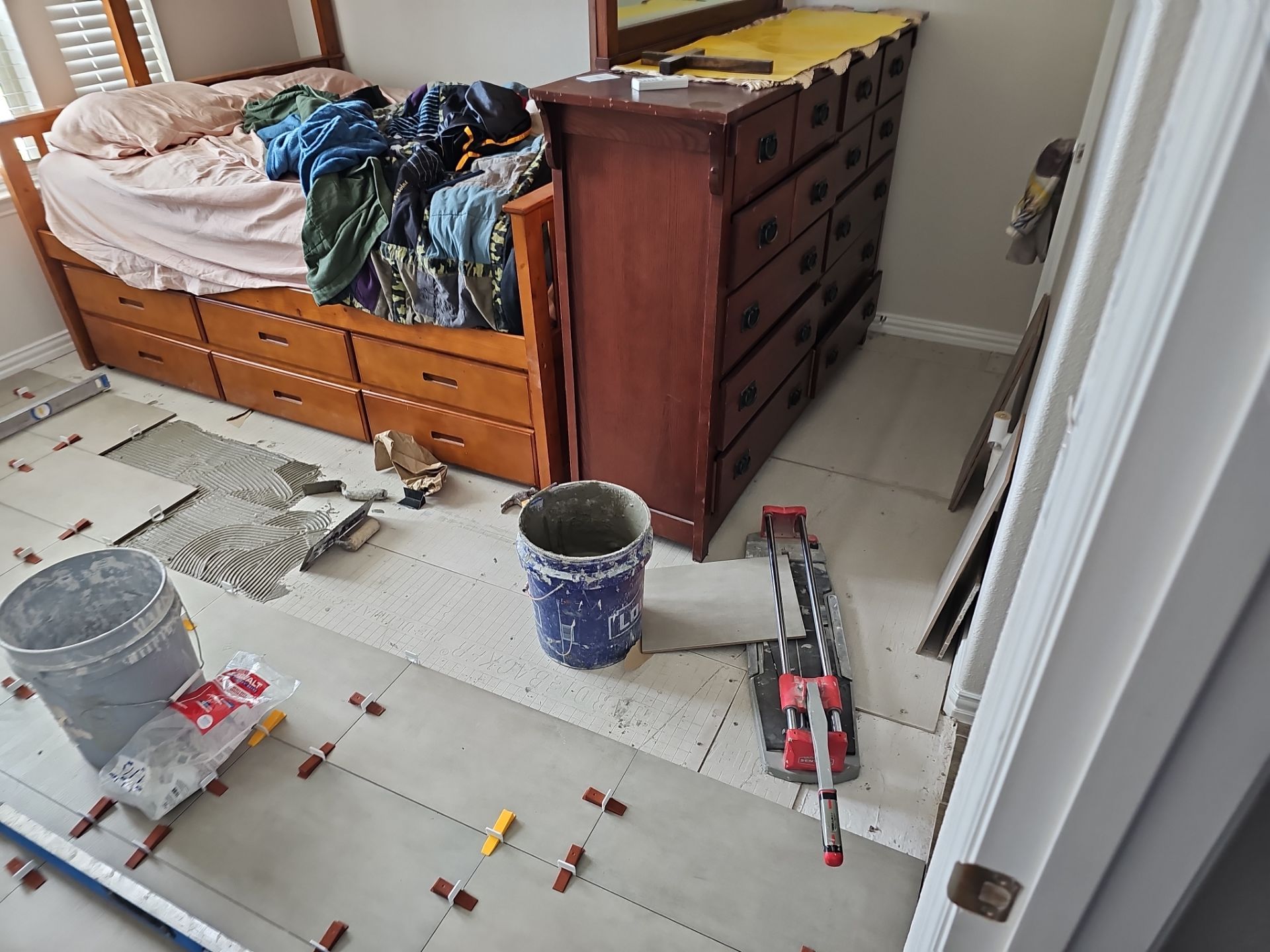 Carpet replacement with Tile and Red Oak Stairs by EL-GC LLC 