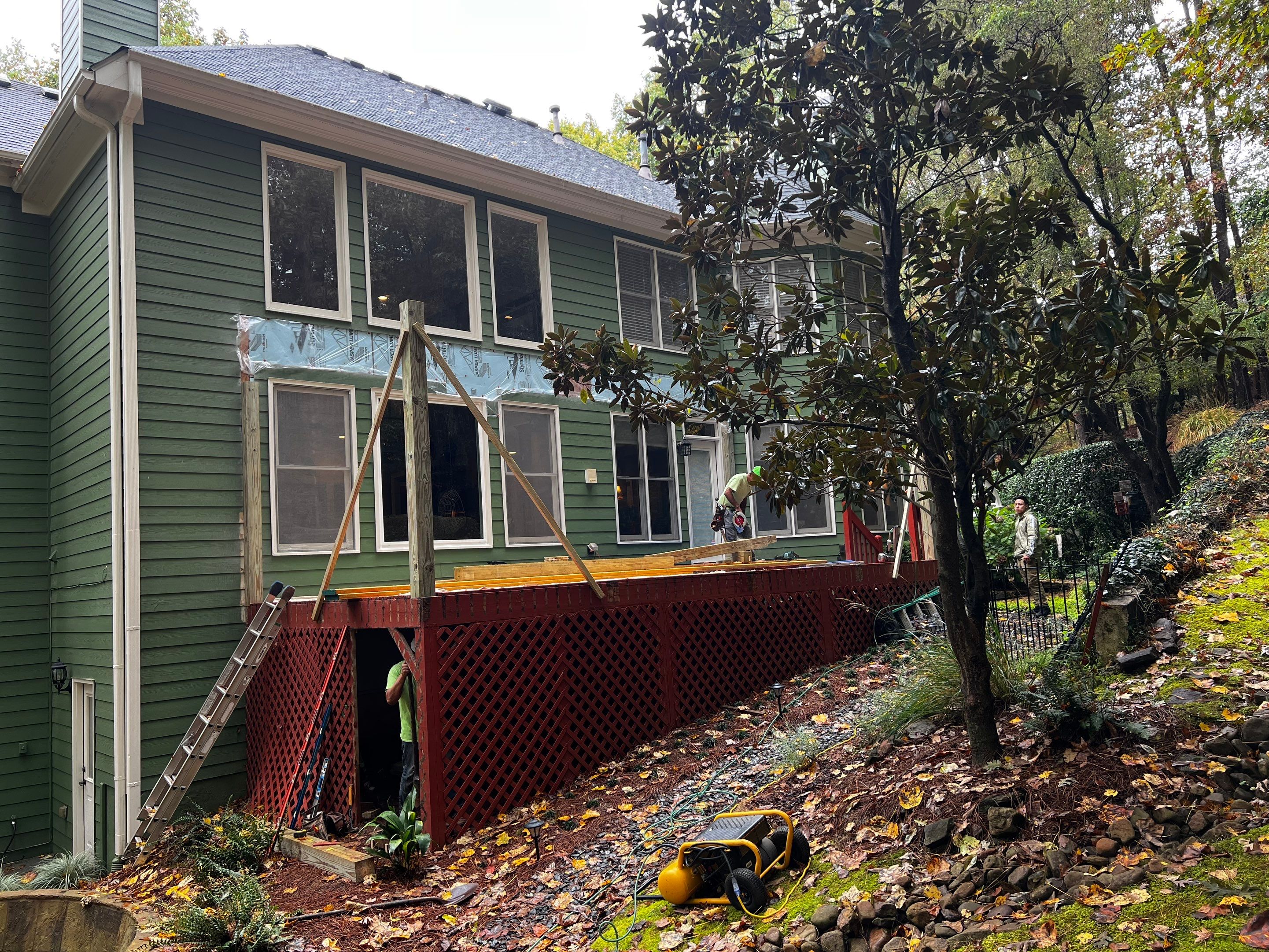 Custom Covered Porch and Wood Deck Addition in Canton by Swift Home Renovations 