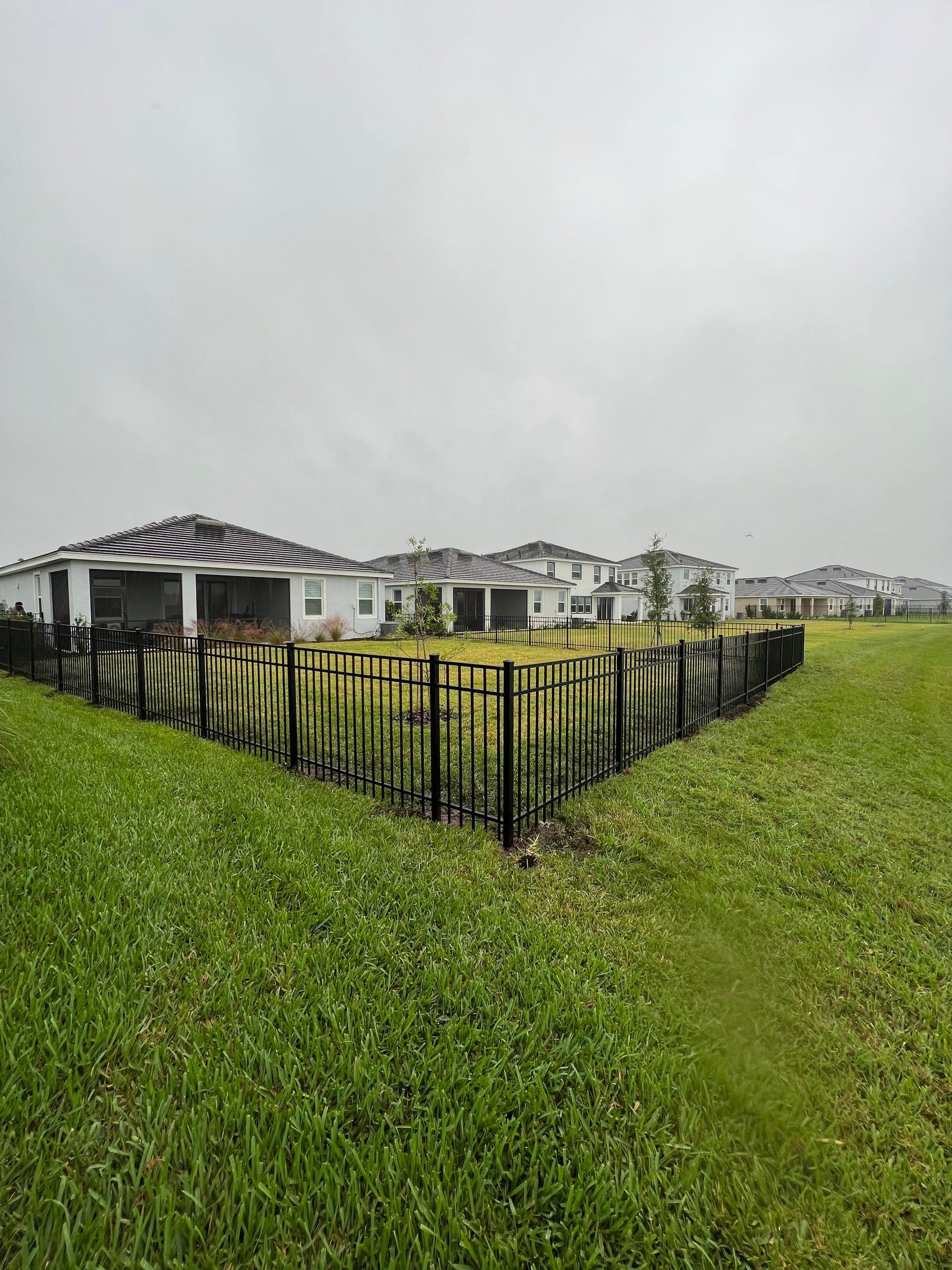 Aluminum Fence Installation using Black 3 Rail Aluminum Fence by Asap fence and gates, LLC