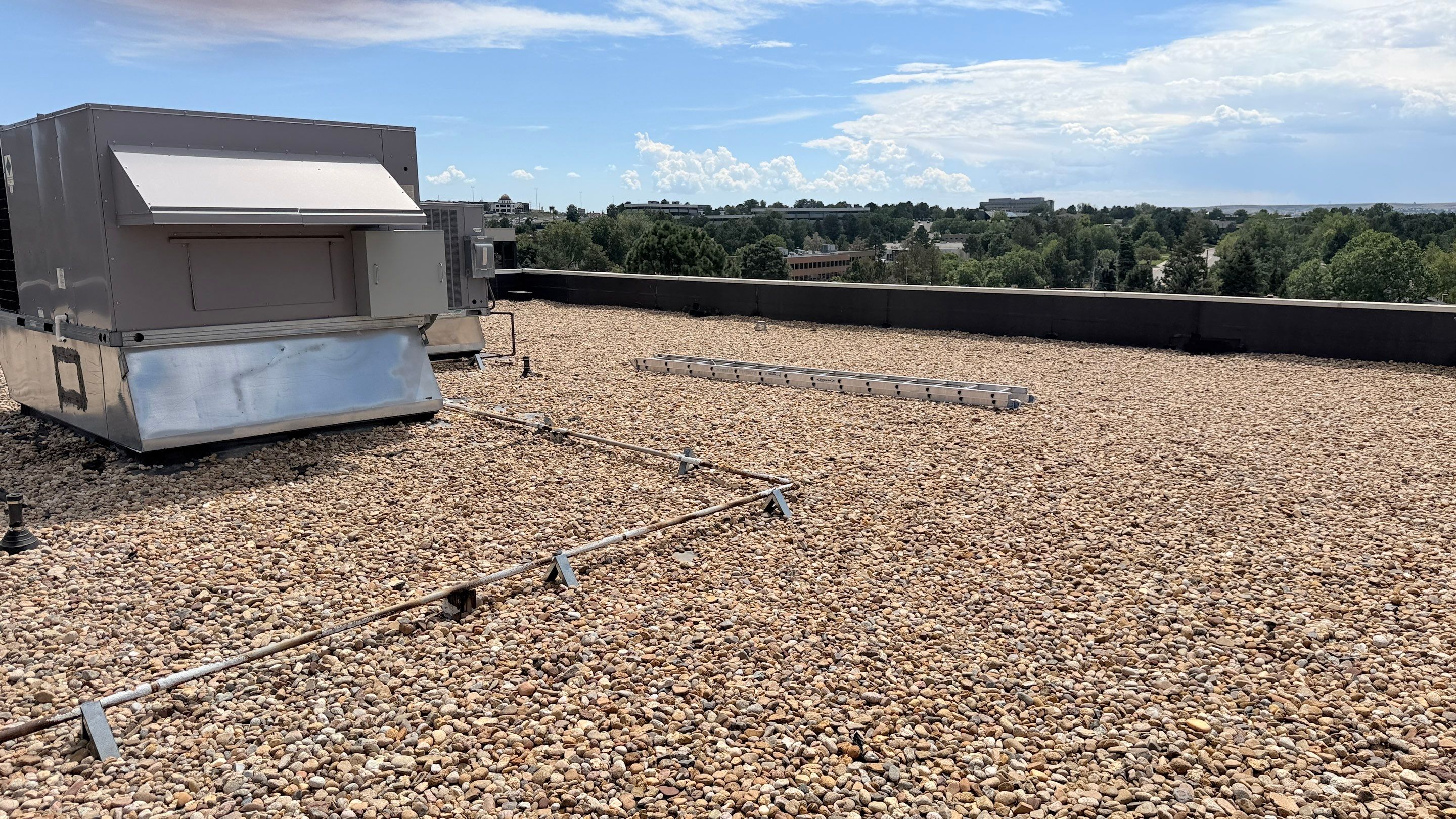 EPDM Commercial Roof Repair and Ballast Maintenance in Centennial by Rhino Roofing LLC