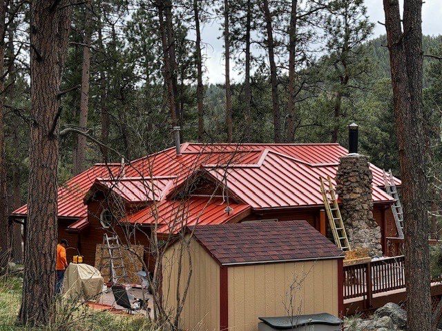 Residential Roofing Installation using Standing Seam Metal by Blue Peaks Roofing LLC 