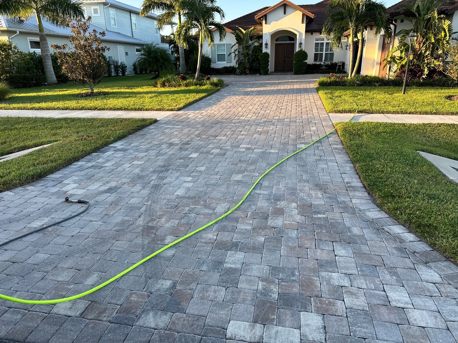 Paver Driveway, Sidewalk, and Pool Deck Cleaning in Winding River Community, Bradenton, FL by Sunshine AquaWash