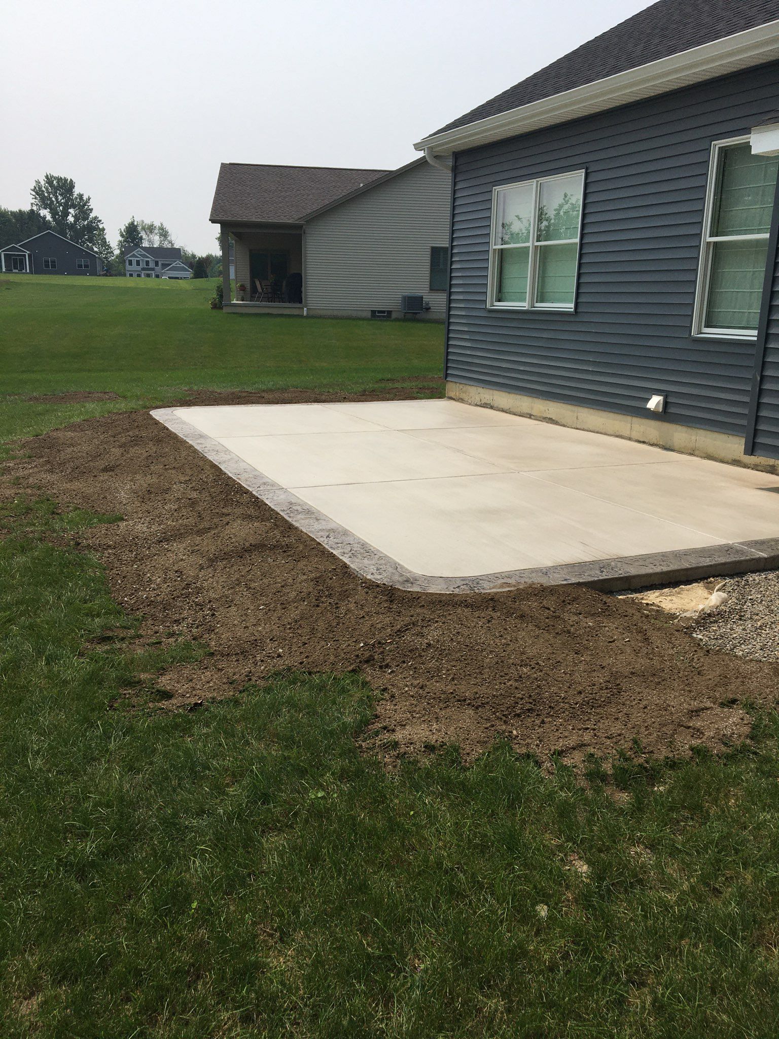 Outdoor Living- Deck and Concrete by Ivy Lea Construction