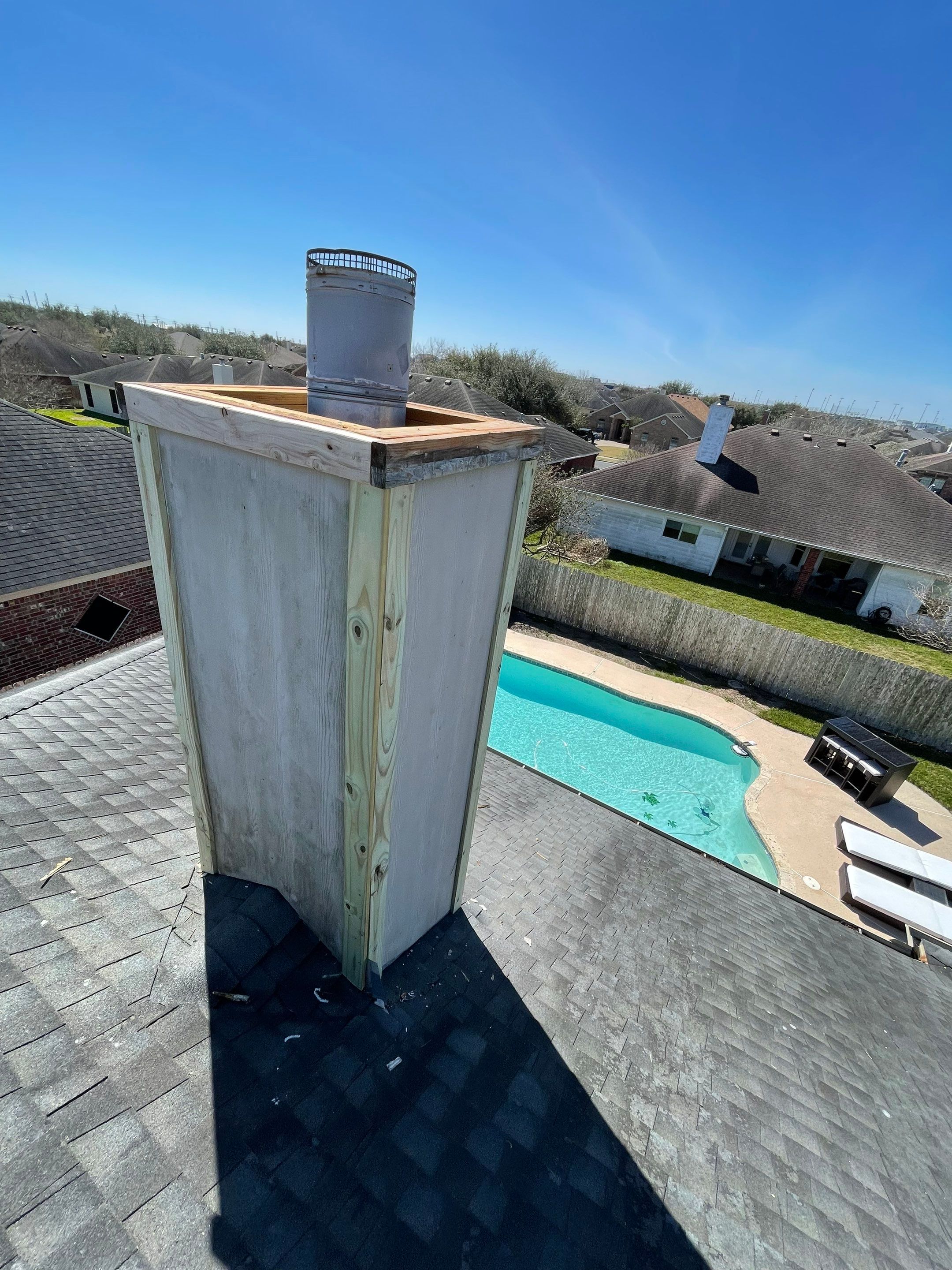 Residential Roofing Repair Replacing Chimney Cap by Lighthouse Roofing