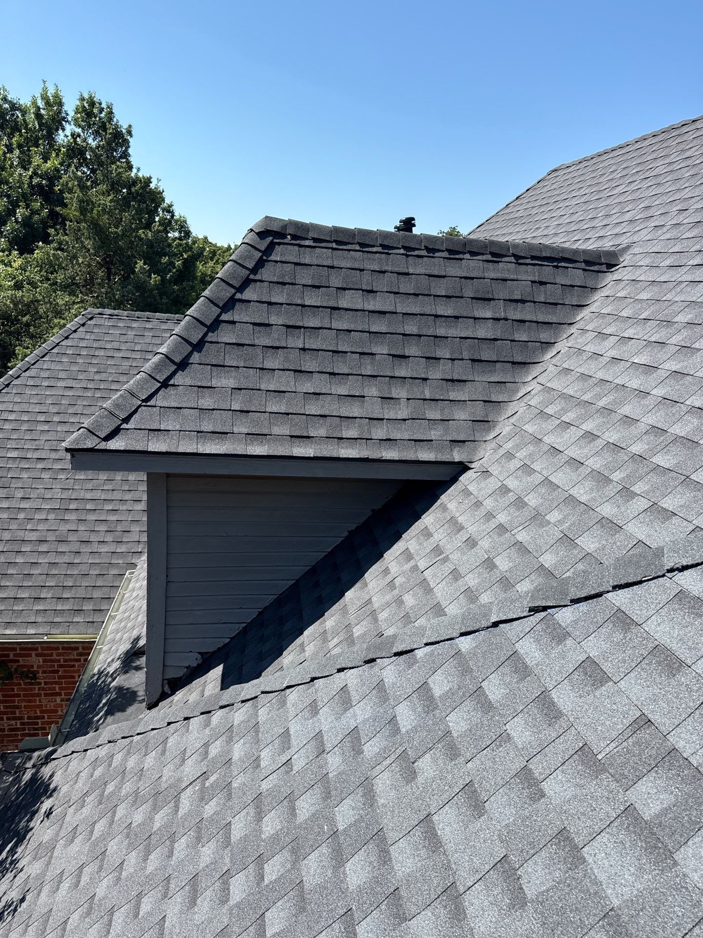 roof replacement & skylight repair in Edmond by McCann's Roofing and Construction