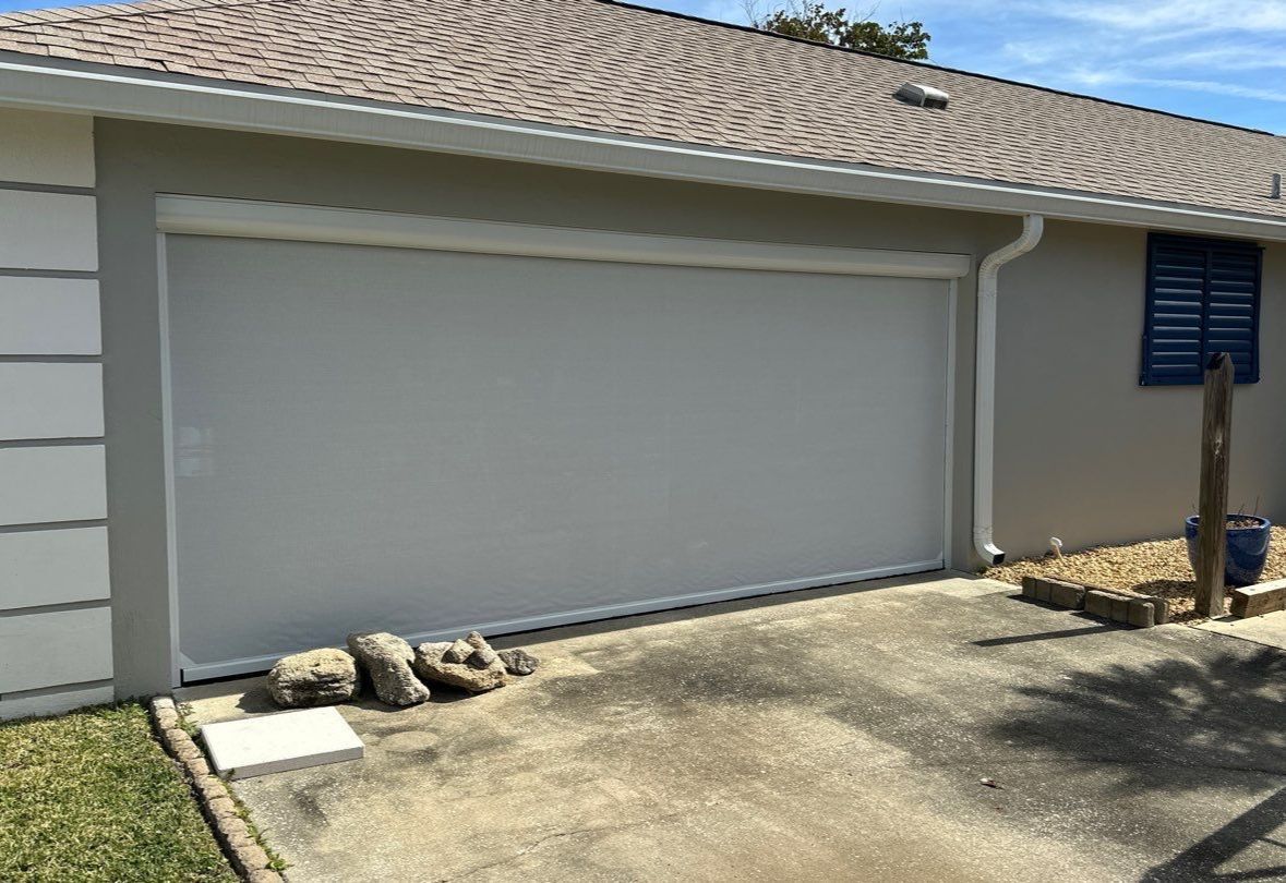 Hurricane Rated Bahama Shutters in Violet Blue / Motorized Bug Screen by Smart Guard Shutters