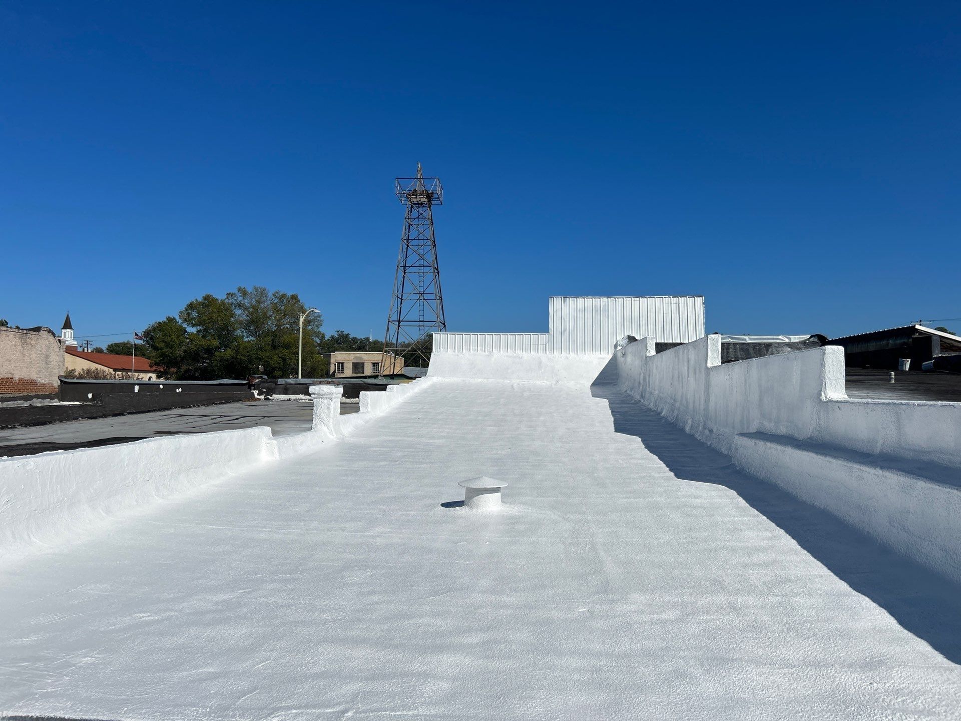 Downtown Gladewater Commercial Foam Roof Restoration – SPF + High-Tensile Acrylic by All Star Roofing LLC