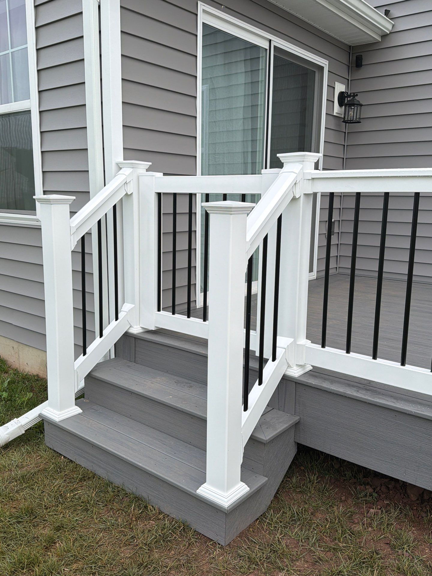 Custom Gray Composite Deck Installation in Duncannon by Esh Builders