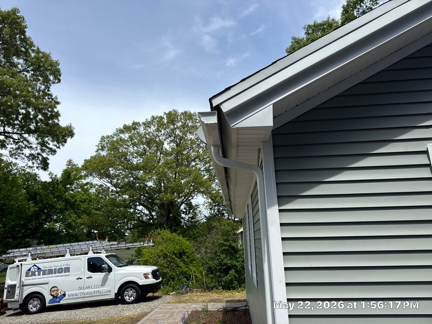 Milford Exterior Renovation Featuring Custom Siding and Wood Deck Installation by A Plus Exterior