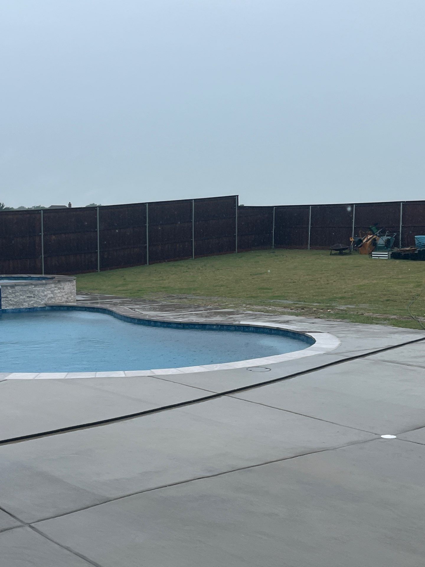 Freeform Pool with Raised Round Spa by Pinnacle Pools and Spas - DFW