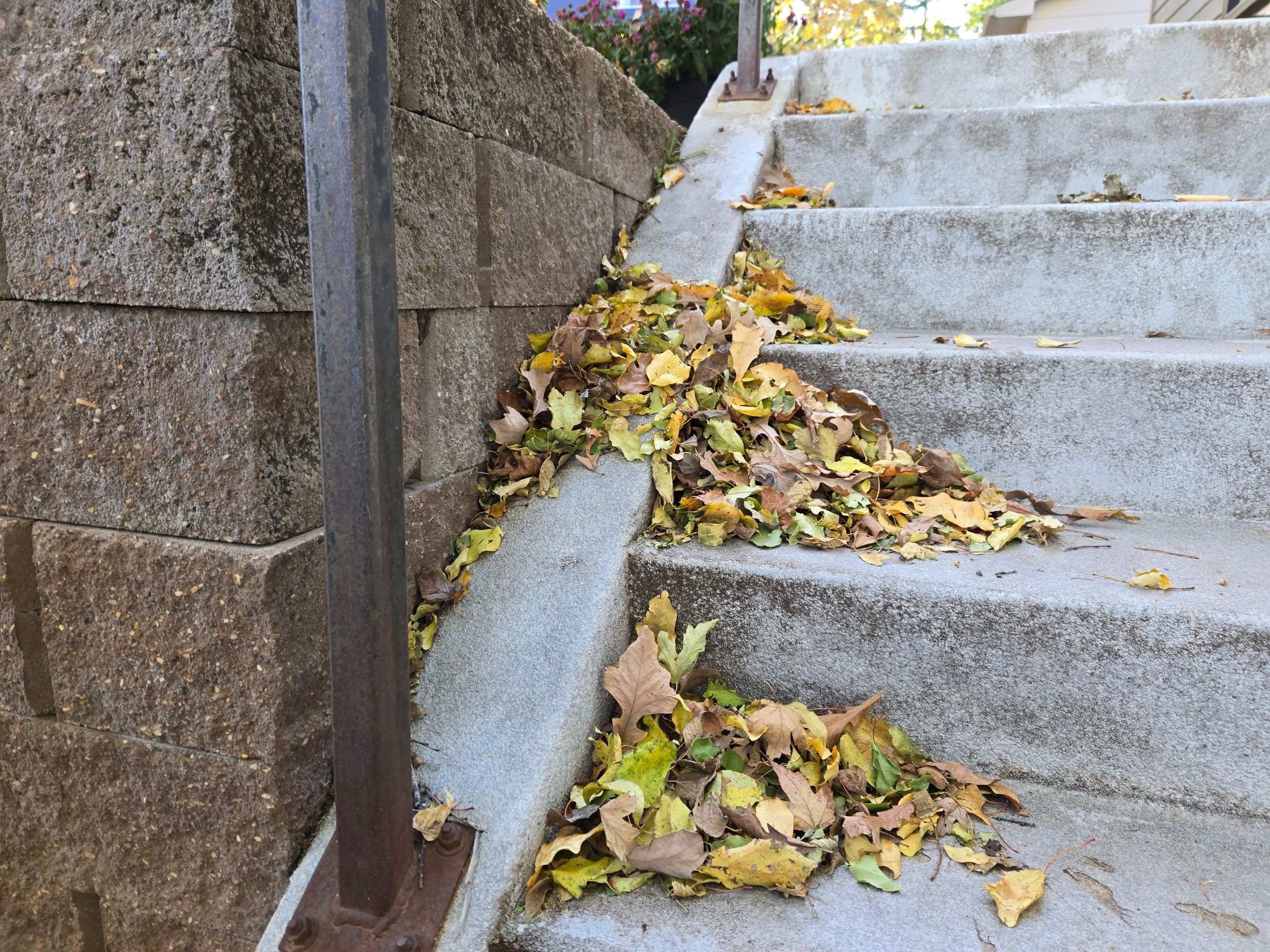 Grey Polyaspartic Porch and Stair Resurfacing in Sioux Falls by Select Painting, Coatings & Garage Cabinets