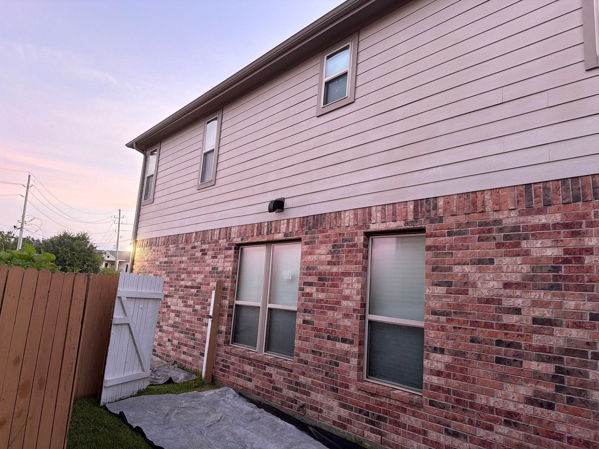 Owens Corning Shingle Roofing Replacement for Houston Two-Story Home by Houston Roofing & Construction