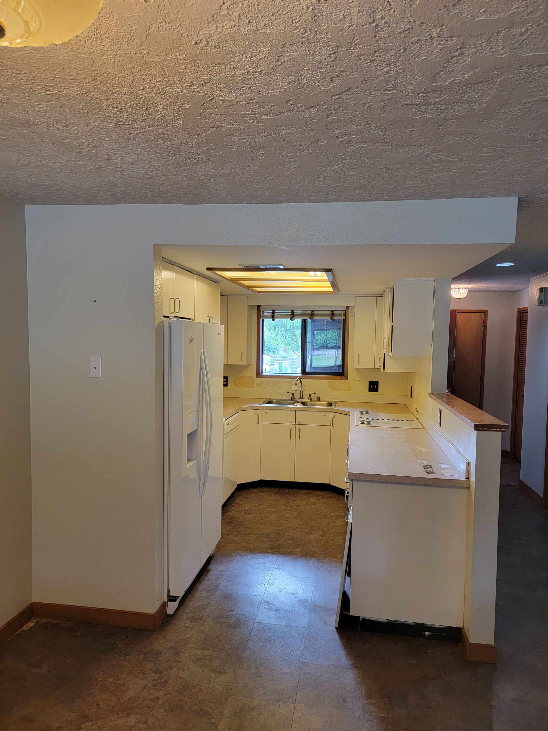 outdated Kitchen to a modern and simplistic kitchen area by Crm Services Llc