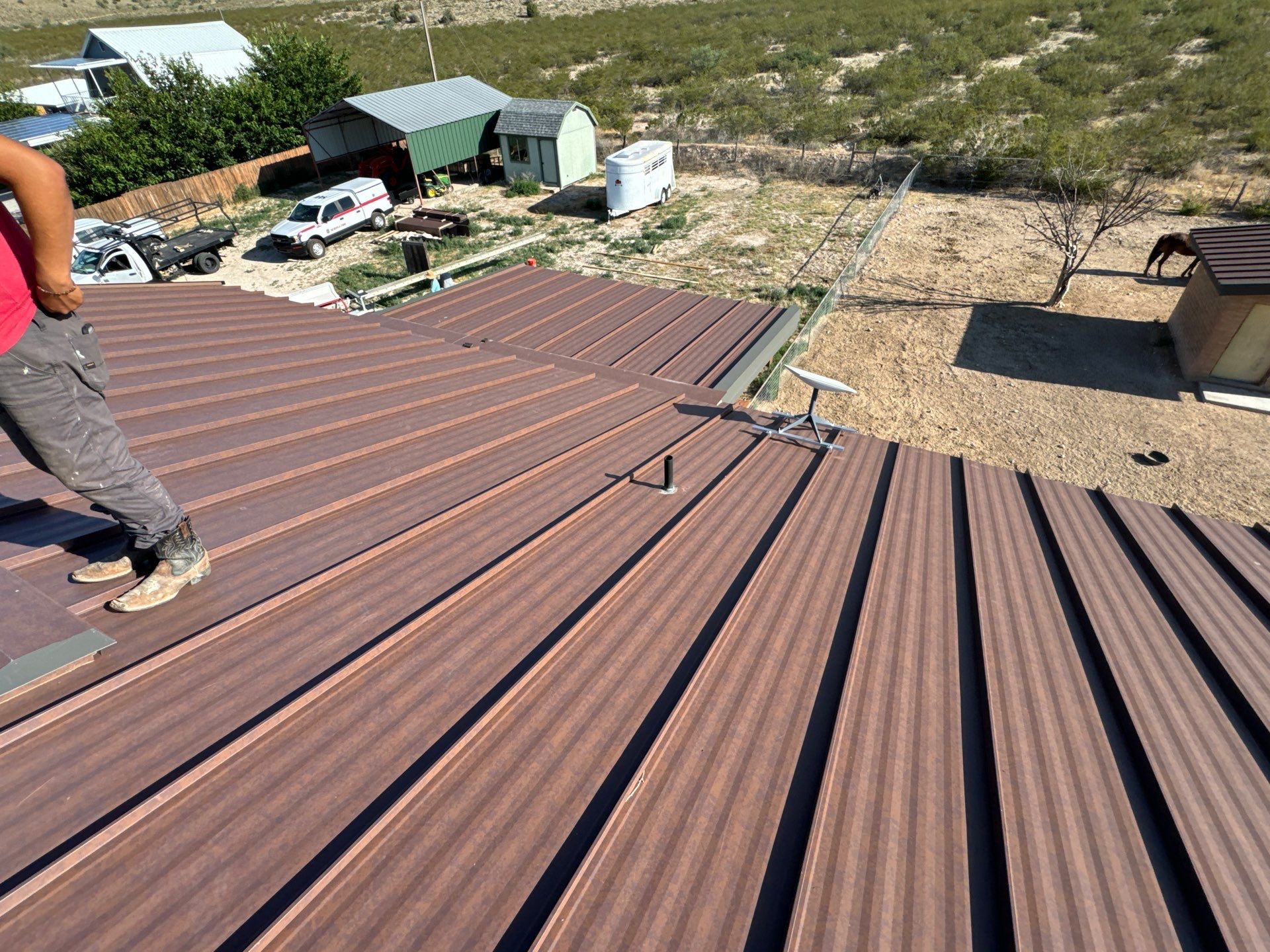 Weathered Rust Standing Seam by Reimagine Roofing