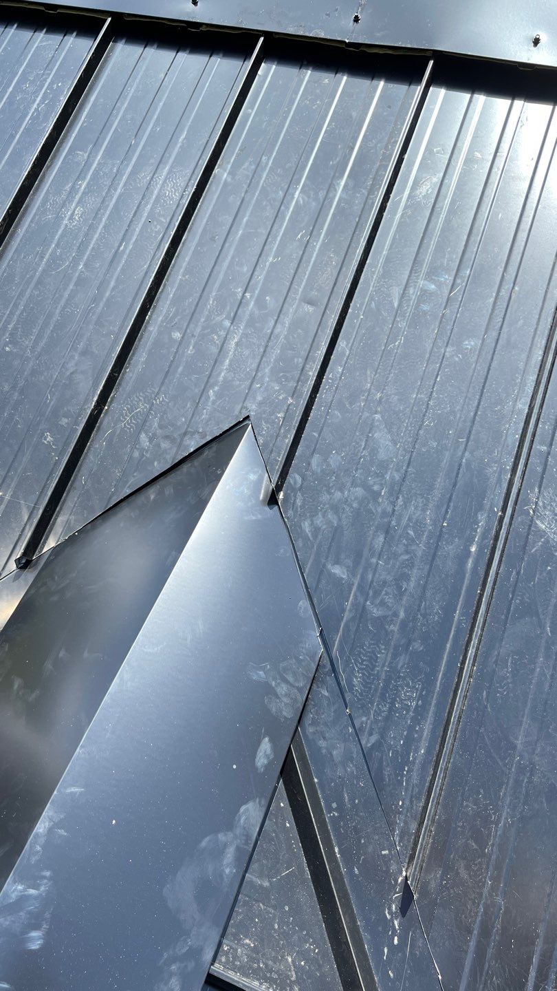 Residential ReRoofing Installation using 12" Prolok metal by Top Notch Roofing Inc