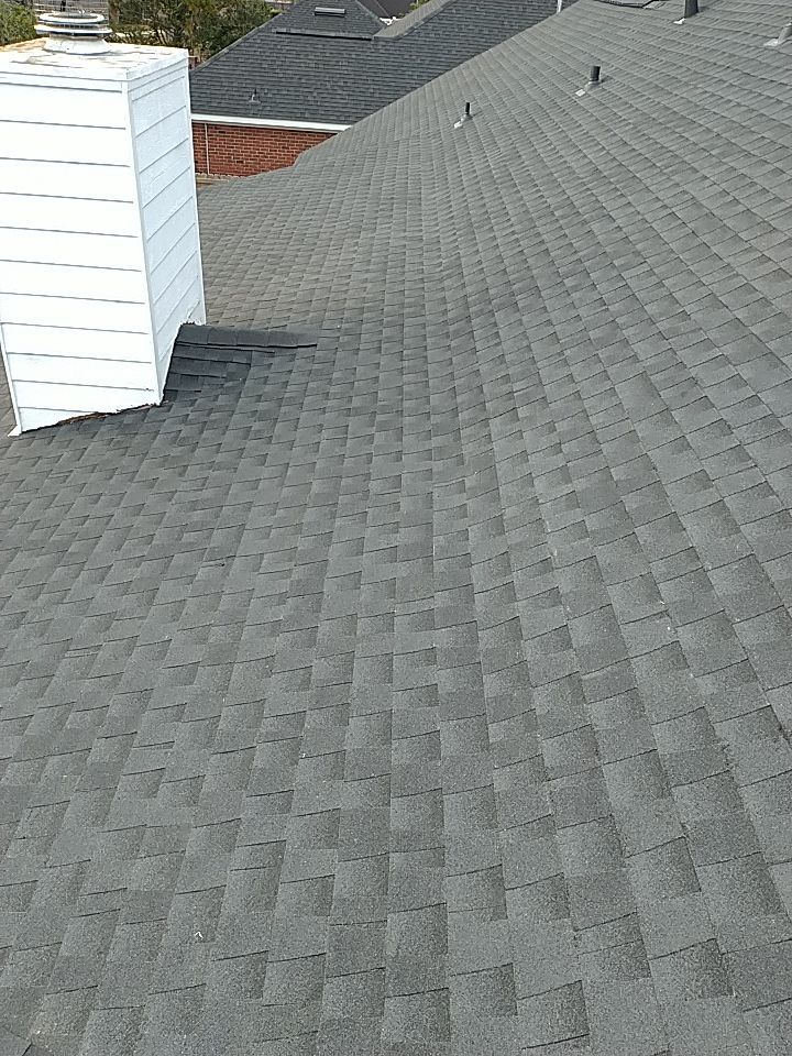 Residential Roofing Installation using Roof Replacement by American Roofing & Construction LLC