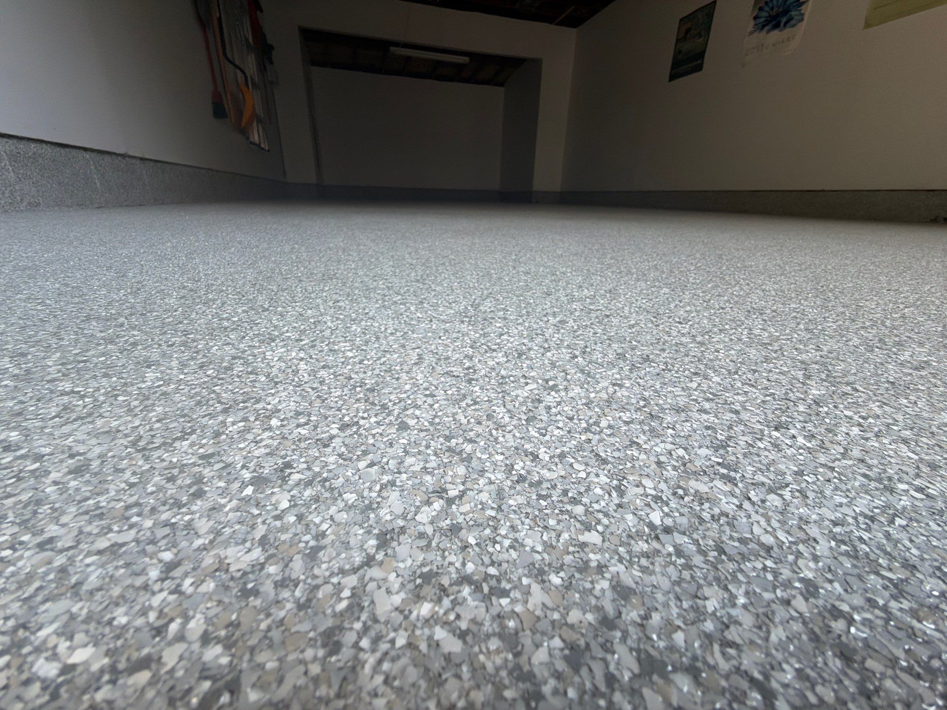 Custom Rocky Ridge Flake Epoxy Floor Installation in Spring Lake by Gordon Painting