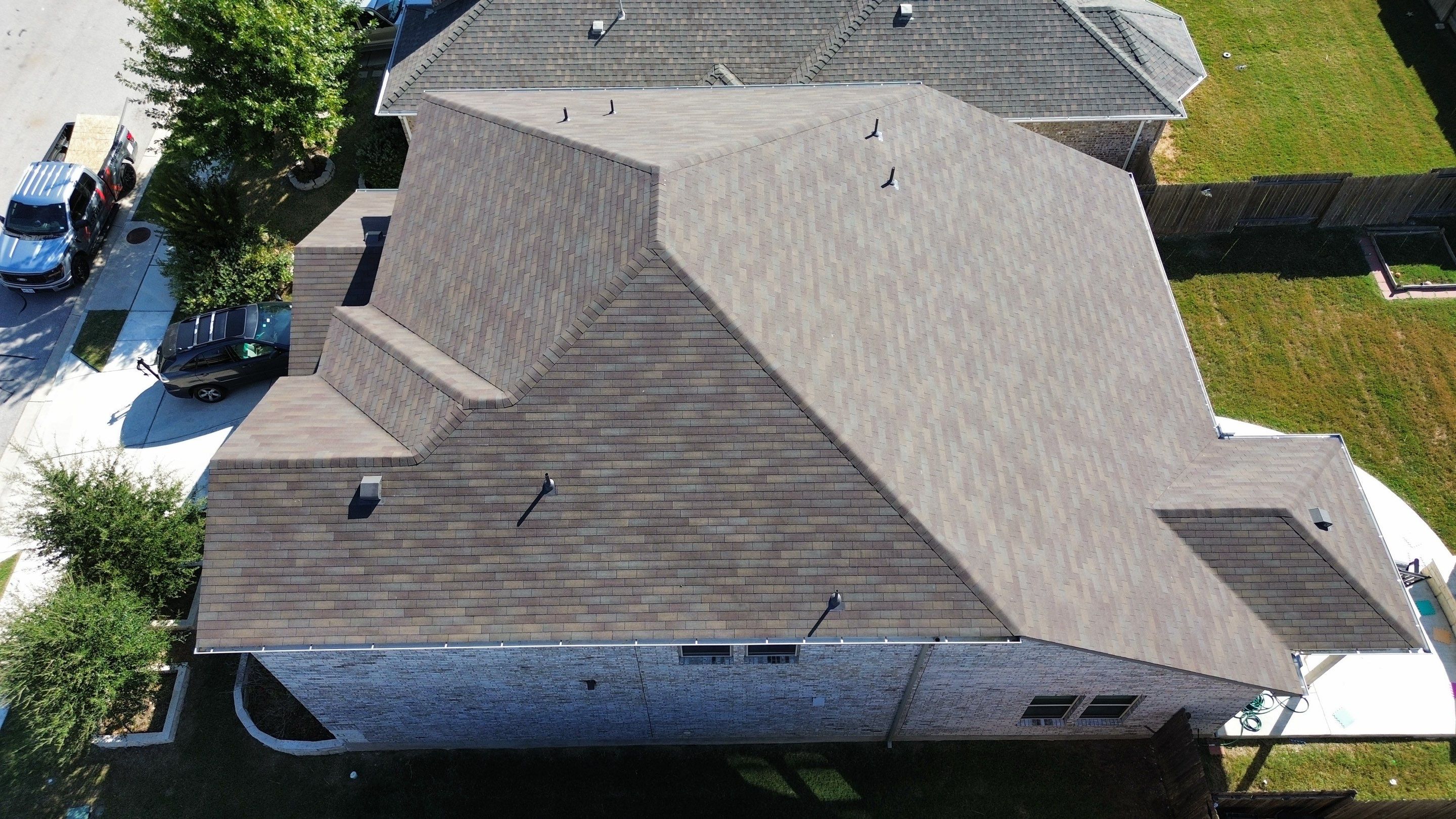 Residential Roof Installation ā Supreme Teak Shingles | Leander, TX by Kstylez Roofing & Construction