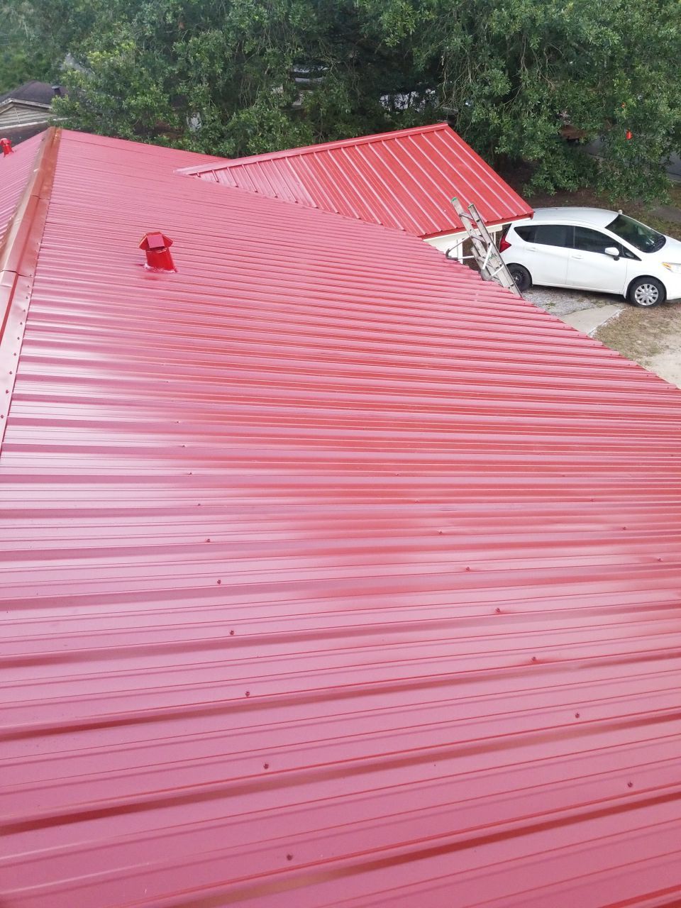 Residential Roofing Installation using Metal roofing by American Roofing & Construction LLC