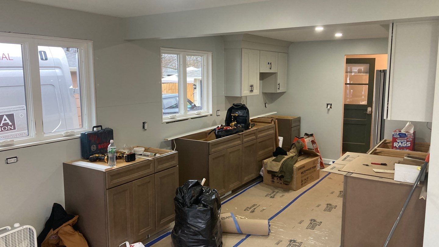 Interior Renovations, Kitchen Remodel, and Window Replacement by Ivy Lea Construction
