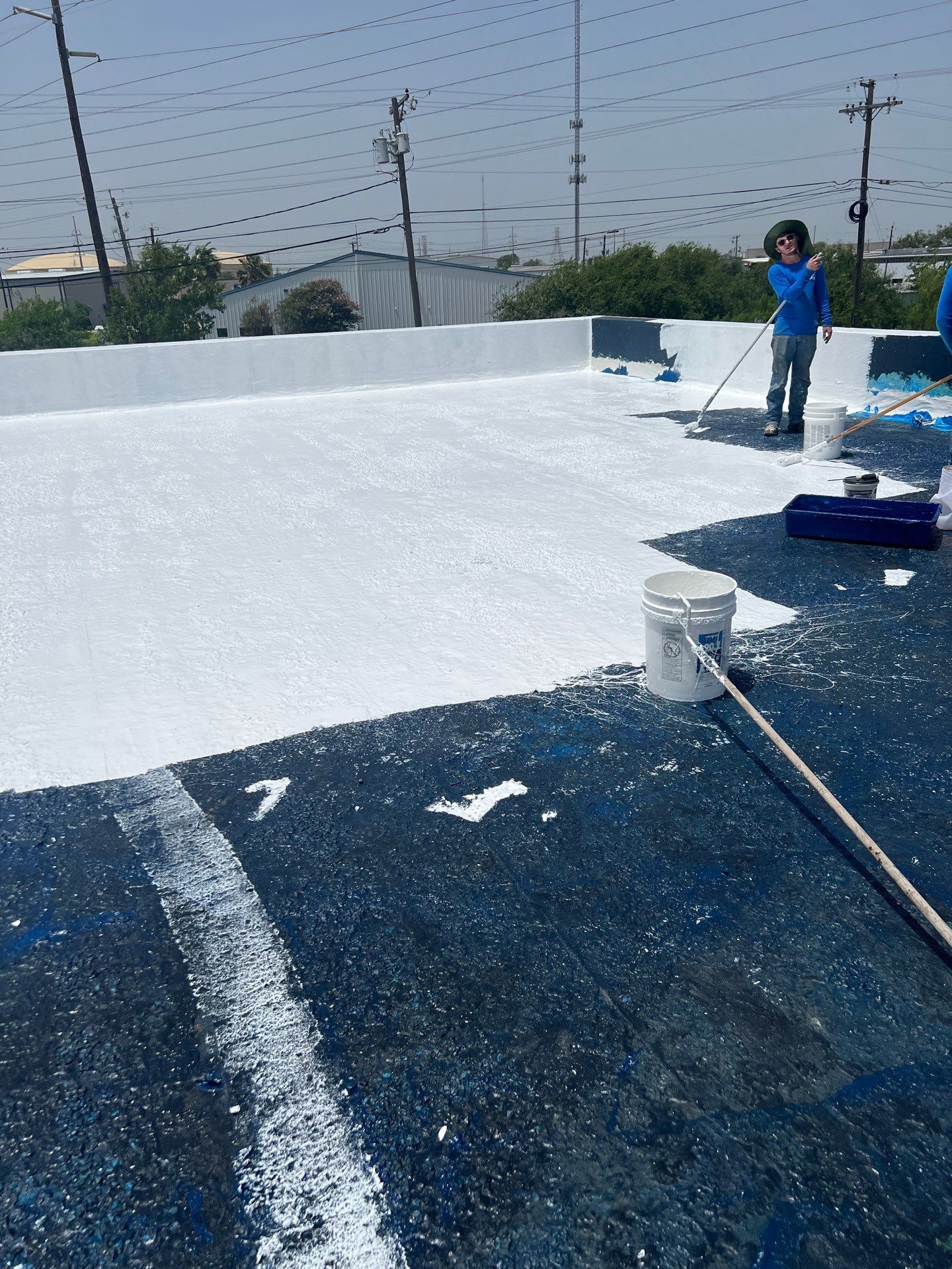 Dirty leaking Gravel Roof by Bayfront Roofing and Construction