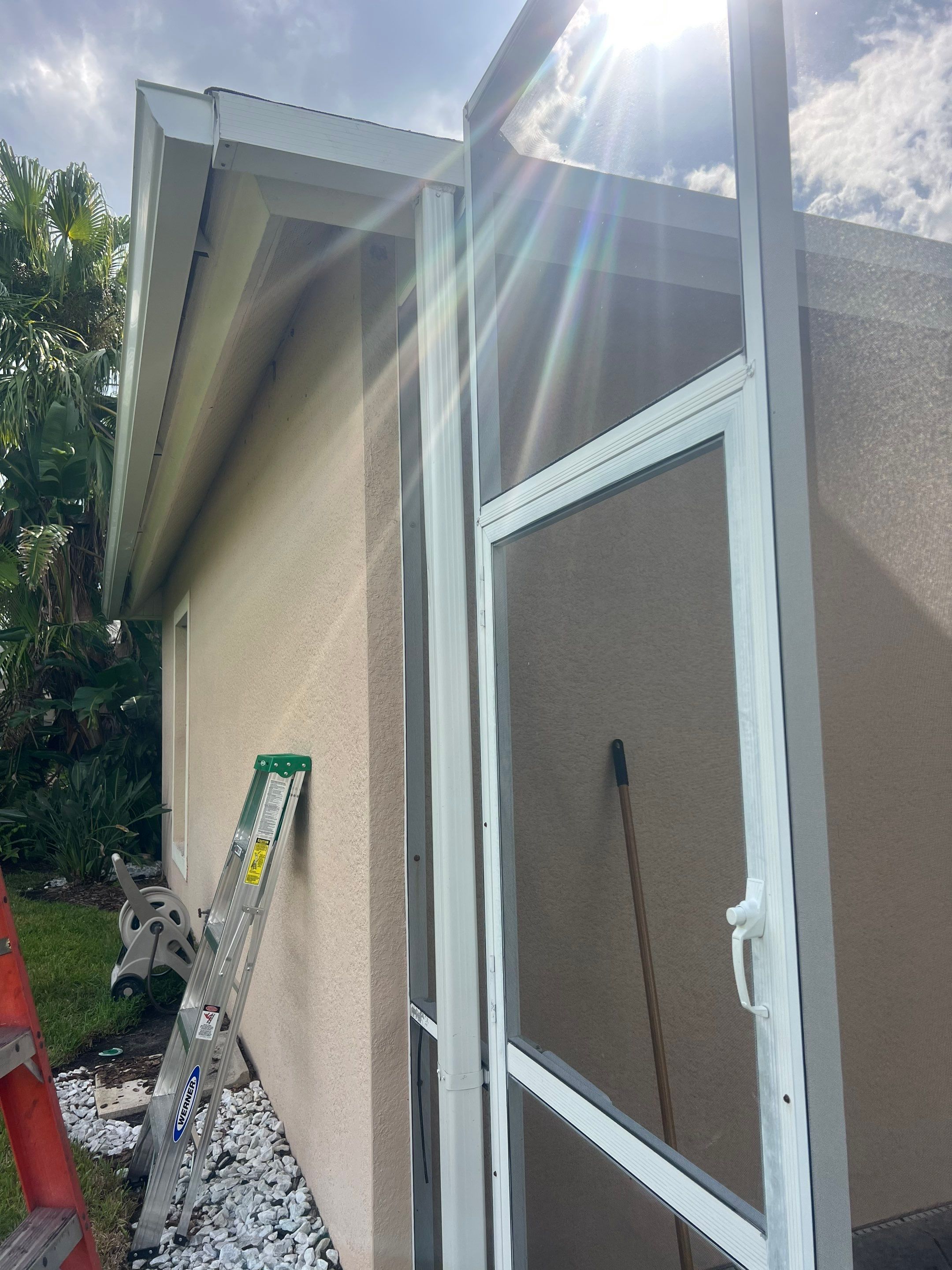 White Gutters and White Downspouts by Gutter Professors