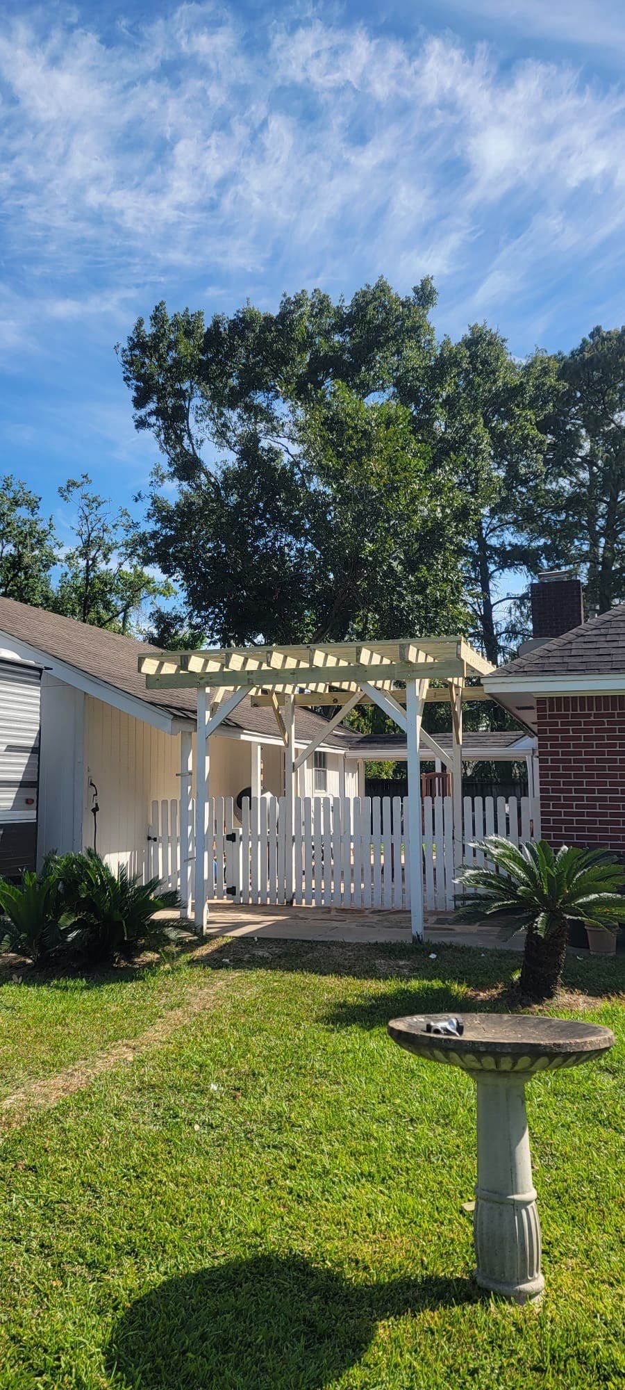 🌿 Rodney – Full Gutters, Drainage System, Flagstone Patio & Pergola  Alejandro and the Texas Urban Elements Team recently completed a multi-solution project for Rodney’s home, blending function with design.  ✅ Seamless Gutters We installed a complete 6” seamless gutter system around the home to properly redirect rainwater away from the foundation, protecting siding, paint, and landscaping while boosting curb appeal.  ✅ Drainage System A new PVC storm drainage system was integrated into the gutters and extended to carry roof runoff away from the house. This ensures water won’t pool near the foundation or the new patio area.  ✅ Flagstone Patio Ground We prepped, leveled, and installed a custom flagstone patio for Rodney—delivering both beauty and durability, creating a natural, timeless look that ties perfectly into the yard.  ✅ Pergola Addition To conclude, our framing team constructed a small pergola extension, providing Rodney’s patio with a shaded retreat for family and friends to enjoy.  ✨ Result: A fully protected and enhanced outdoor living space where drainage, stonework, and structure all work together for long-lasting performance and comfort.  📢 At Texas Urban Elements, we specialize in building solutions that protect homes while creating beautiful outdoor environments. by Texas Urban Elements