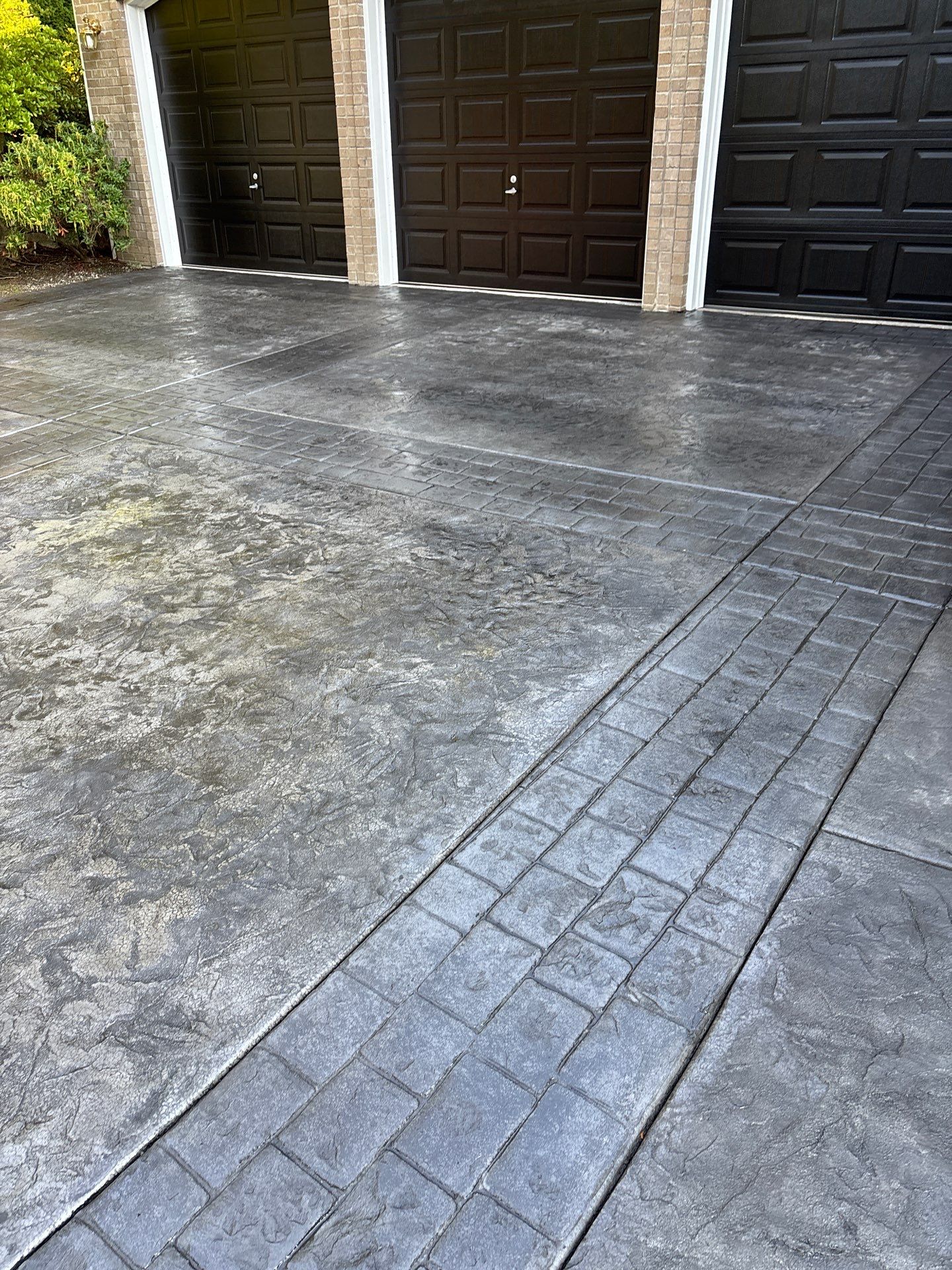 Multi-color Stamped & Sealed Concrete Driveway Renovation | Mukilteo by Jireh Asphalt & Concrete Inc