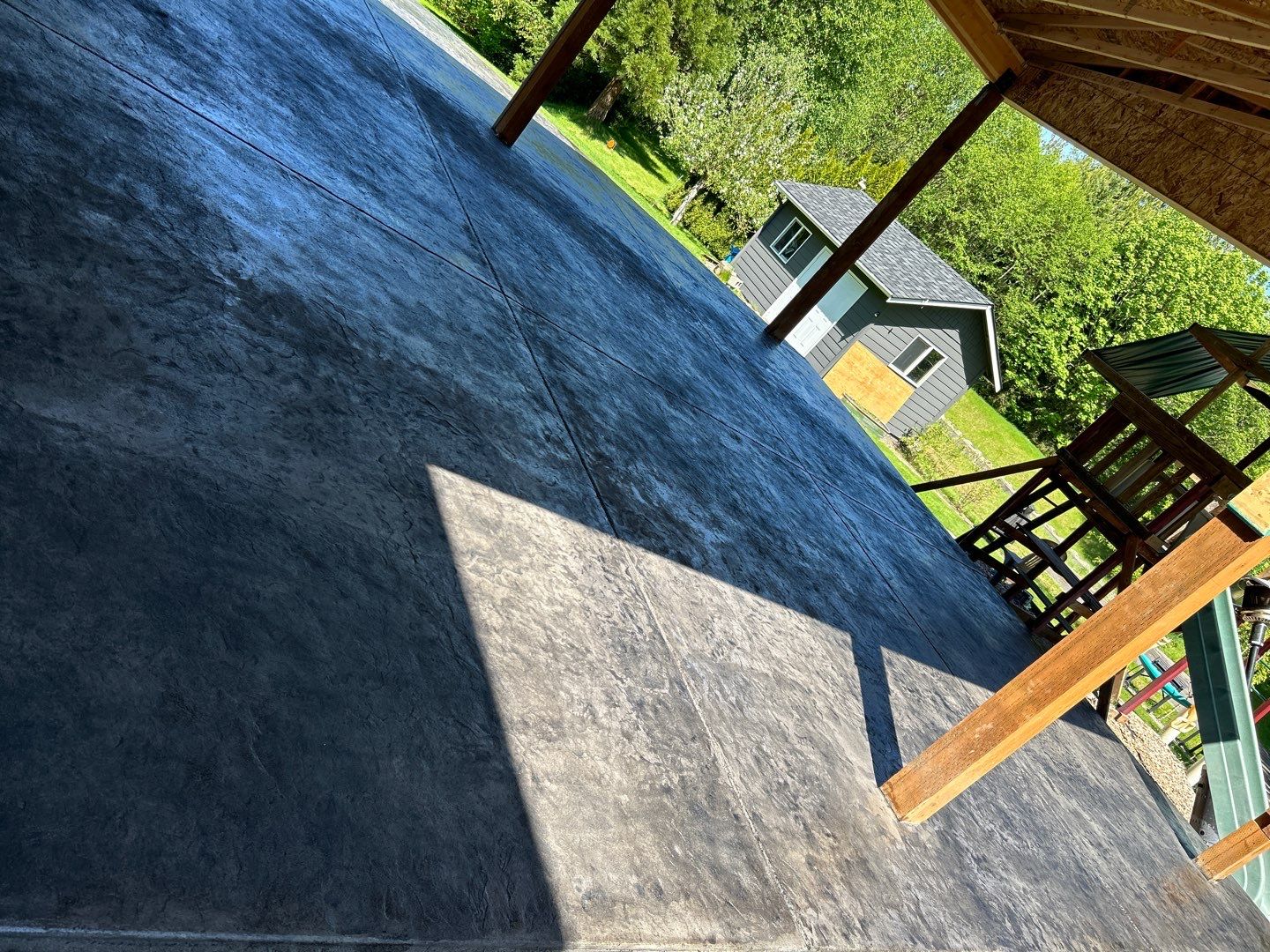 Ty | Concrete Patio by Jireh Asphalt & Concrete Inc 