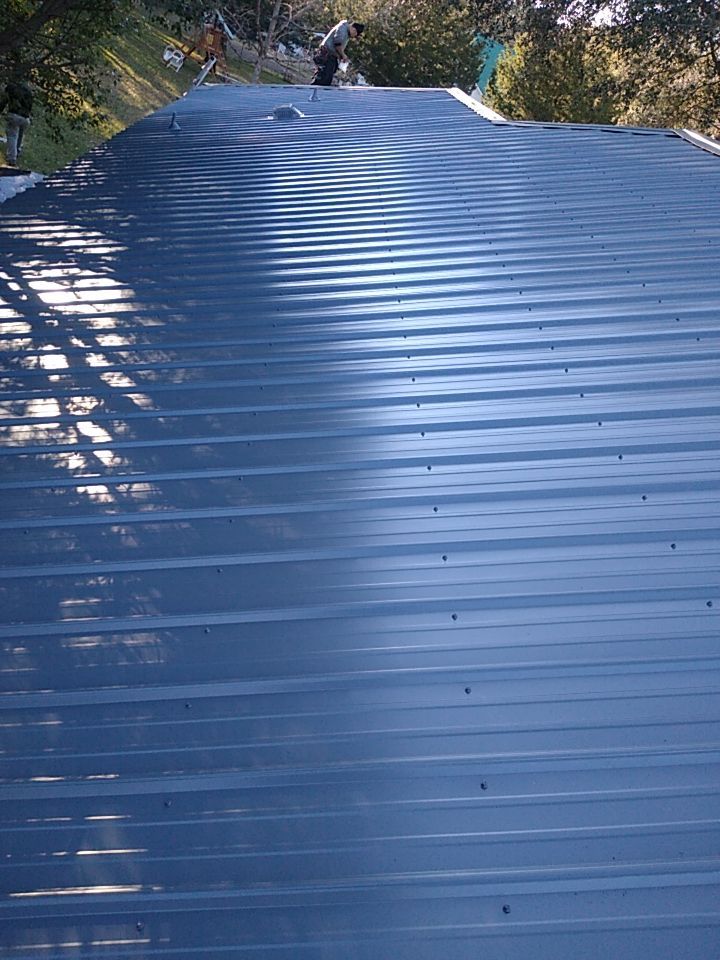 Residential Roofing Installation using Roof Replacement by American Roofing & Construction LLC
