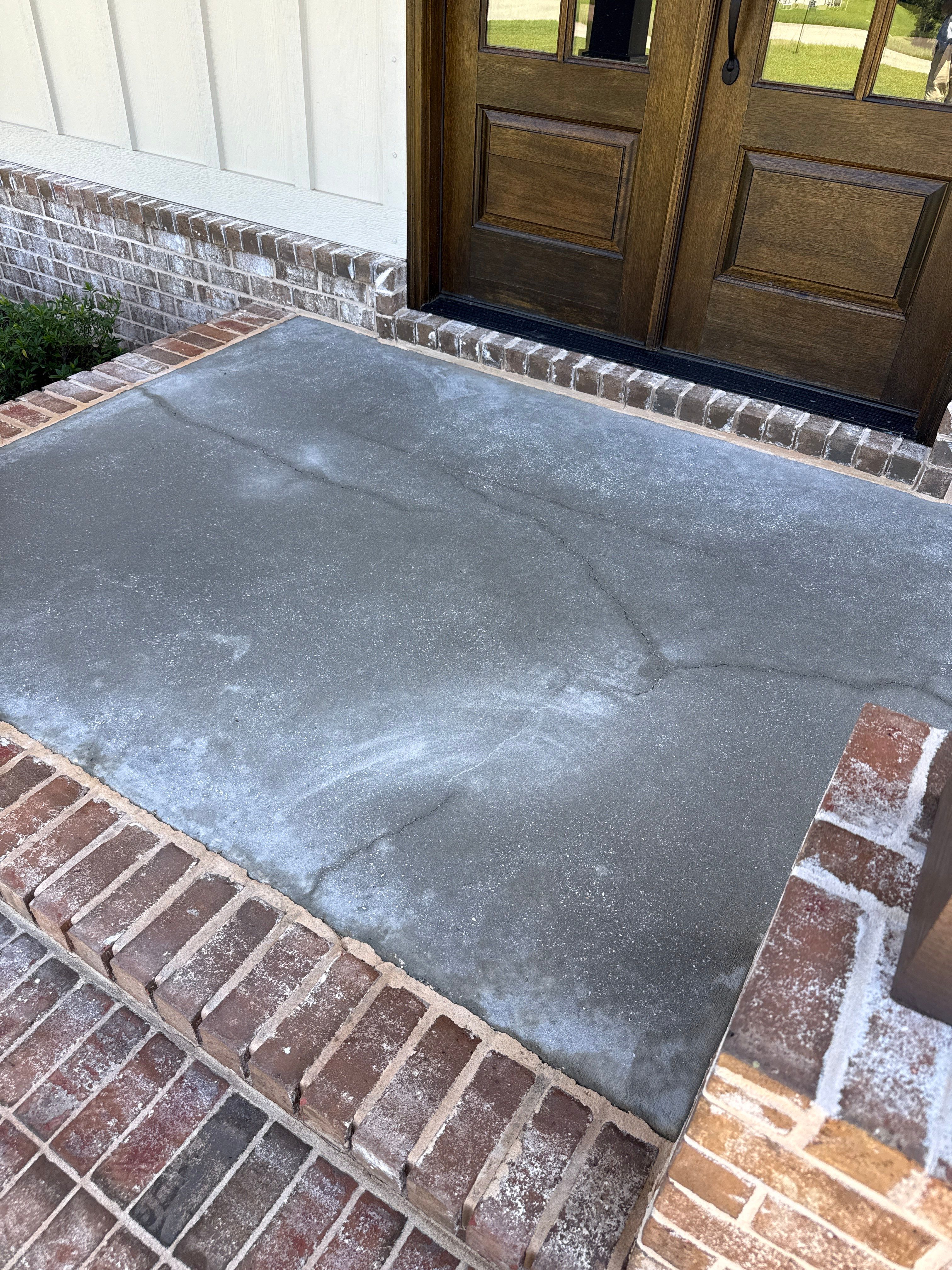 Decorative Stained Concrete Overlay and Garage Floor Coating in Mobile by Cornerstone Hard Surface Restoration 