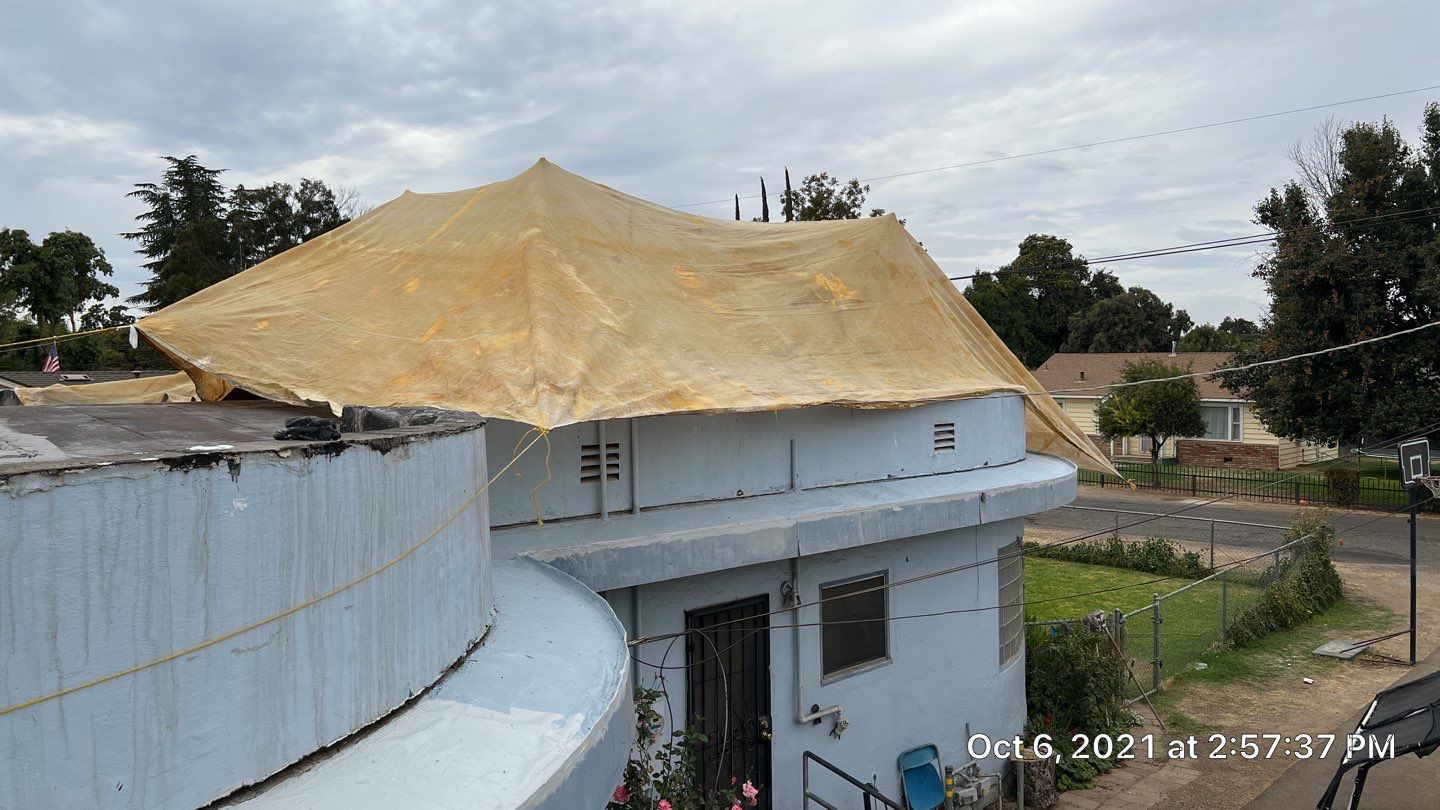 Residential Roofing Installation using Spray foam roofing insulation and General Coatings acrylic coatings by Straight Edge Roofing Inc