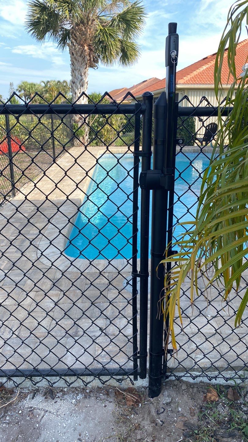 Chain-link Fence Installation using Coated Chain-link Fence by Asap fence and gates, LLC