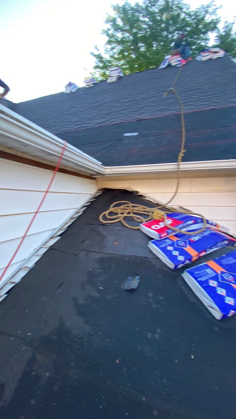 Asphalt Roof Replacement by Custom Installations