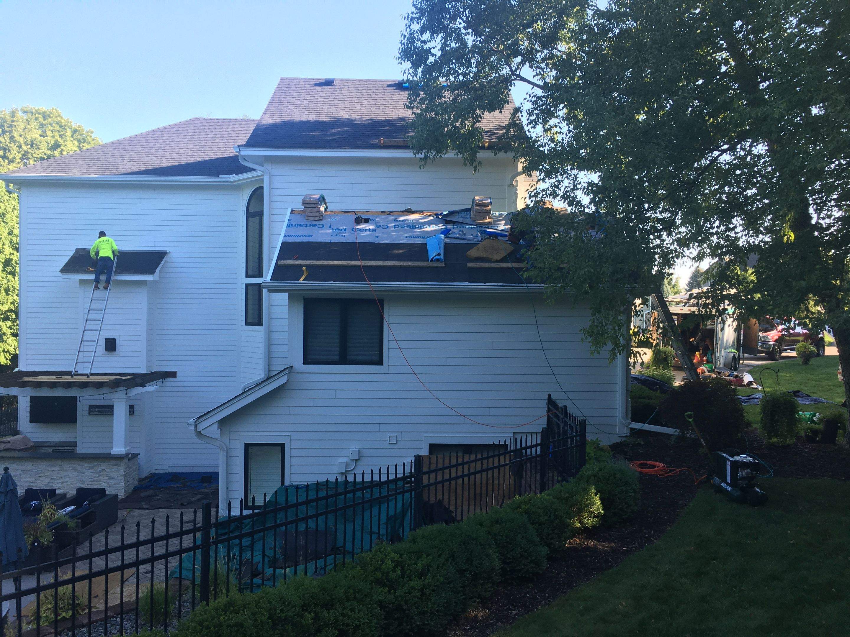 Residential Roofing Installation using Certainteed Landmark Moire Black by MODERN EXTERIOR SYSTEMS
