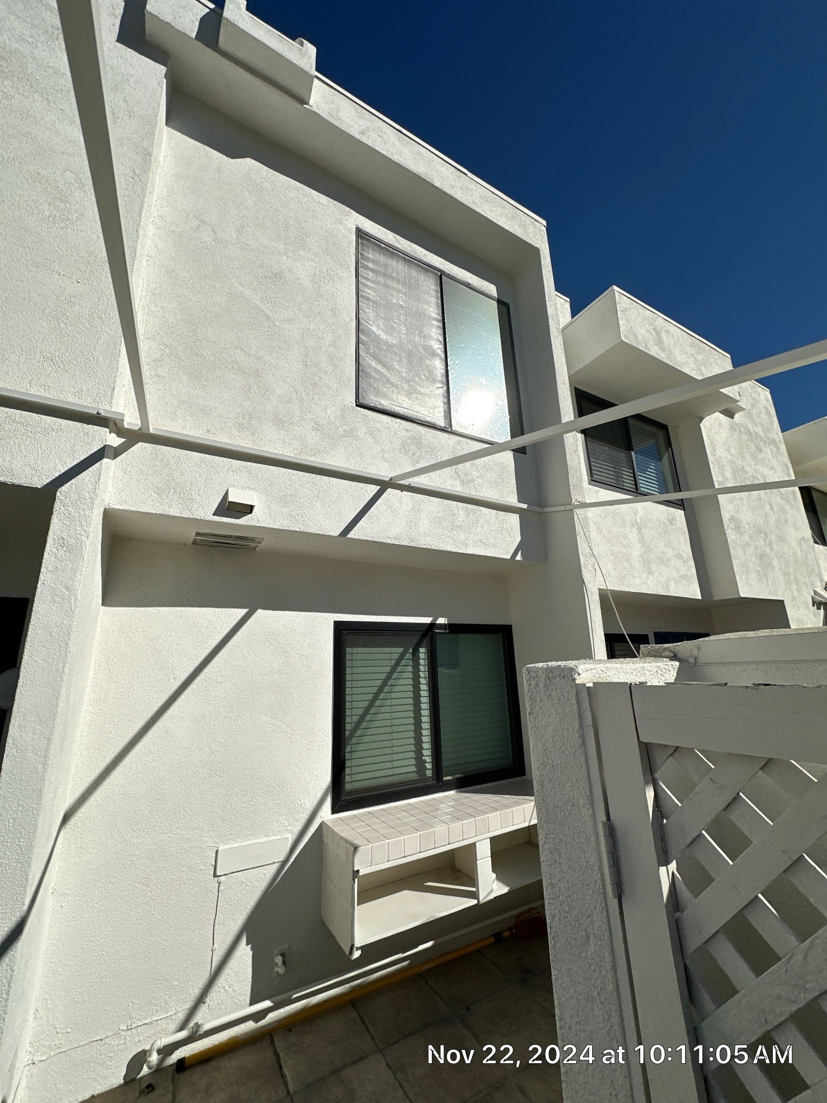 Window Installation using AMSCO Black Vinyl Windows by American Window Company