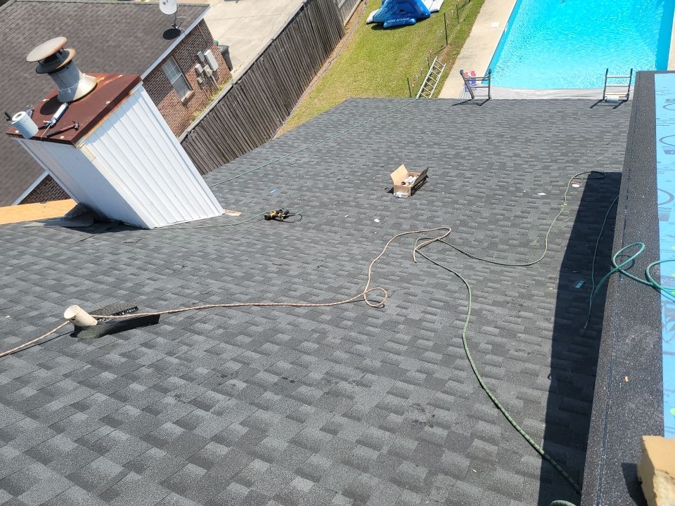Residential Roofing Repair using Roof Replacement by American Roofing & Construction LLC
