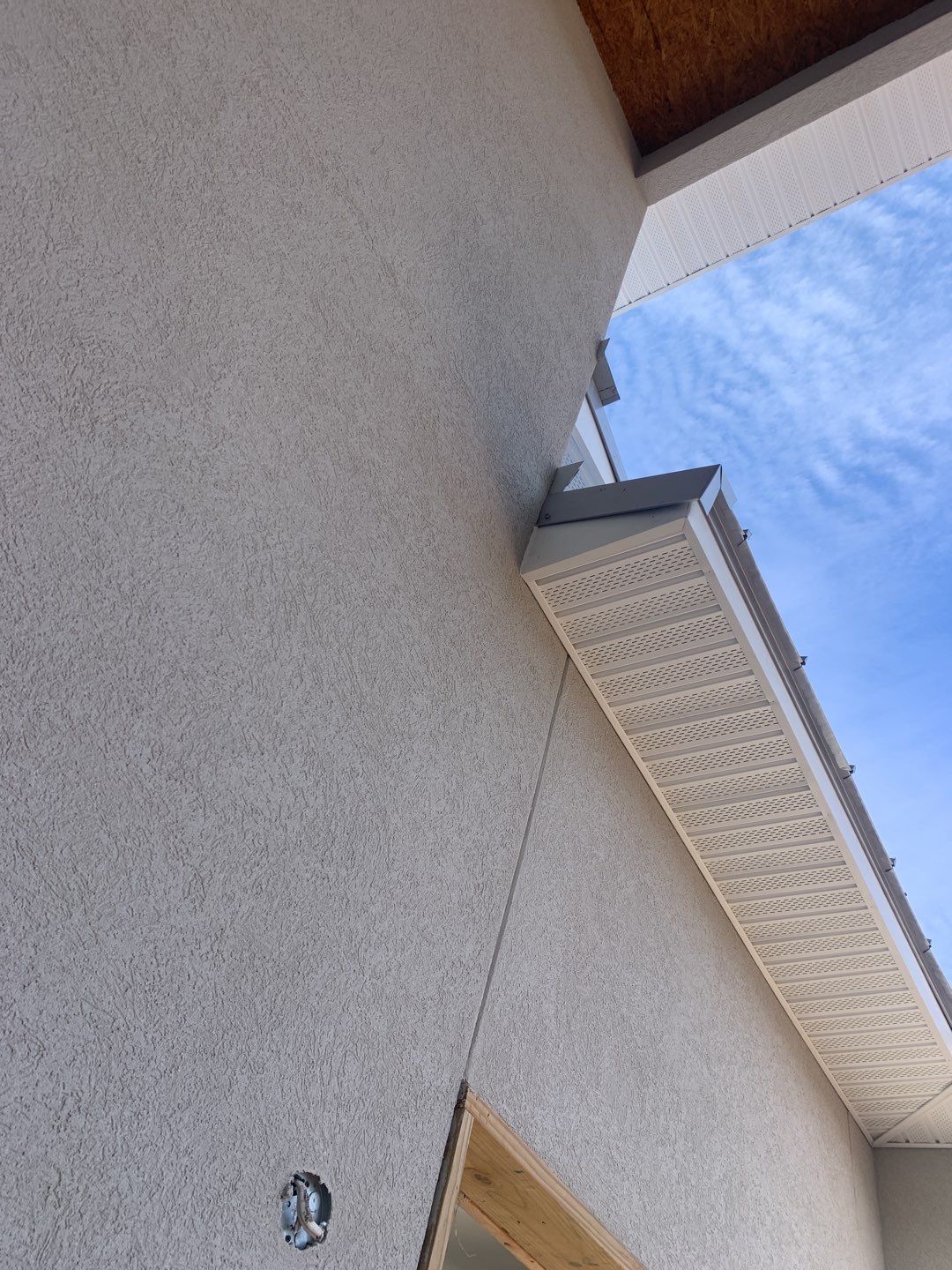 Soffit and Fascia Installation using White Vinyl Soffit in Pensacola FL by Gutter Professors