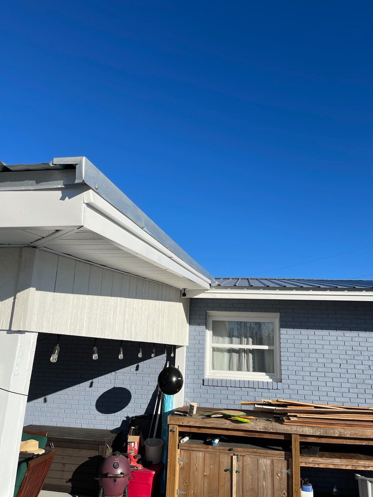 Gutter Installation using K-Style Seamless Gutters and Soffit and Fascia Replacement by Gutter Professors
