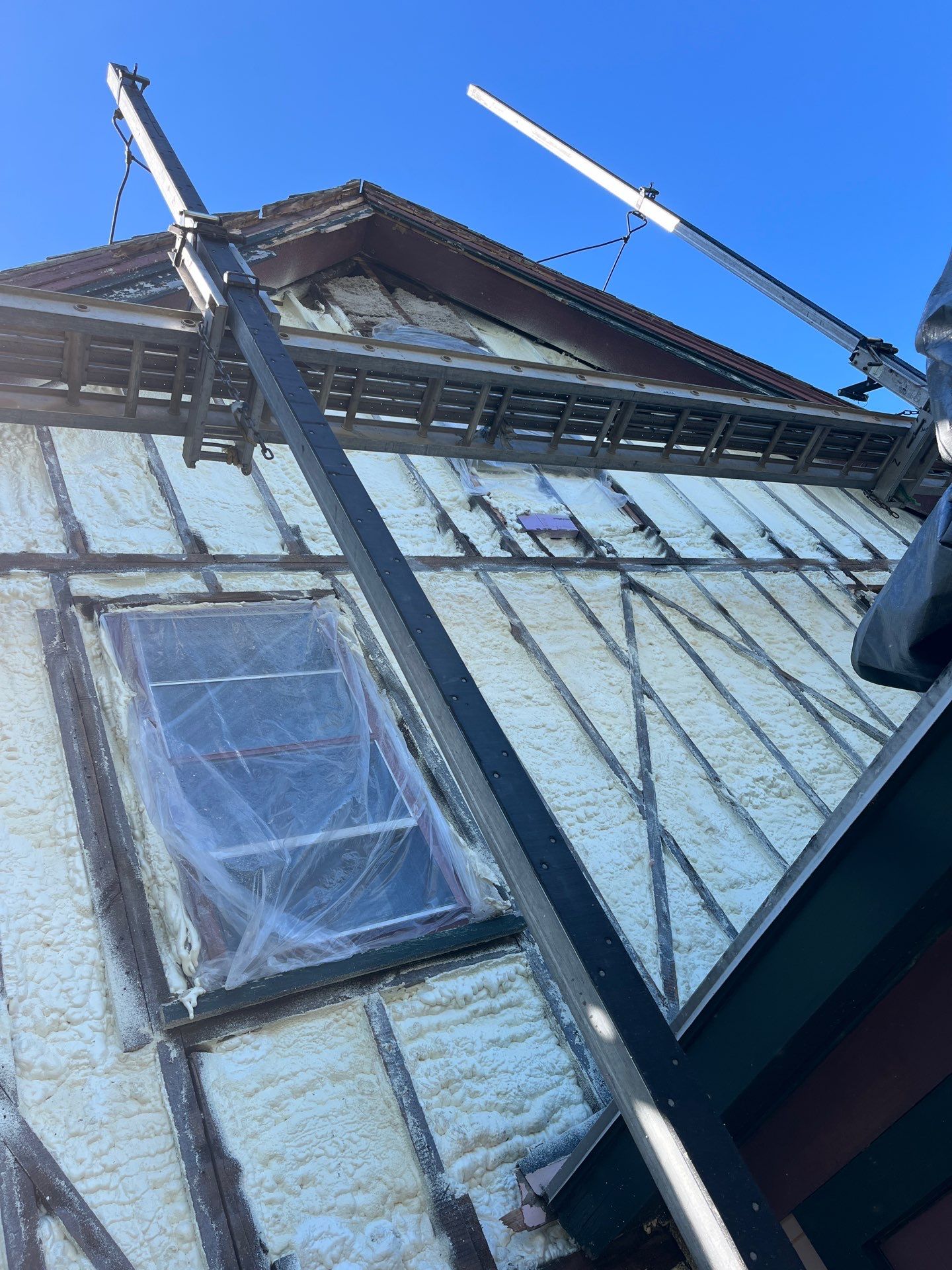 Siding Installation using Closed Cell Spray Foam by NYS Foam & Energy