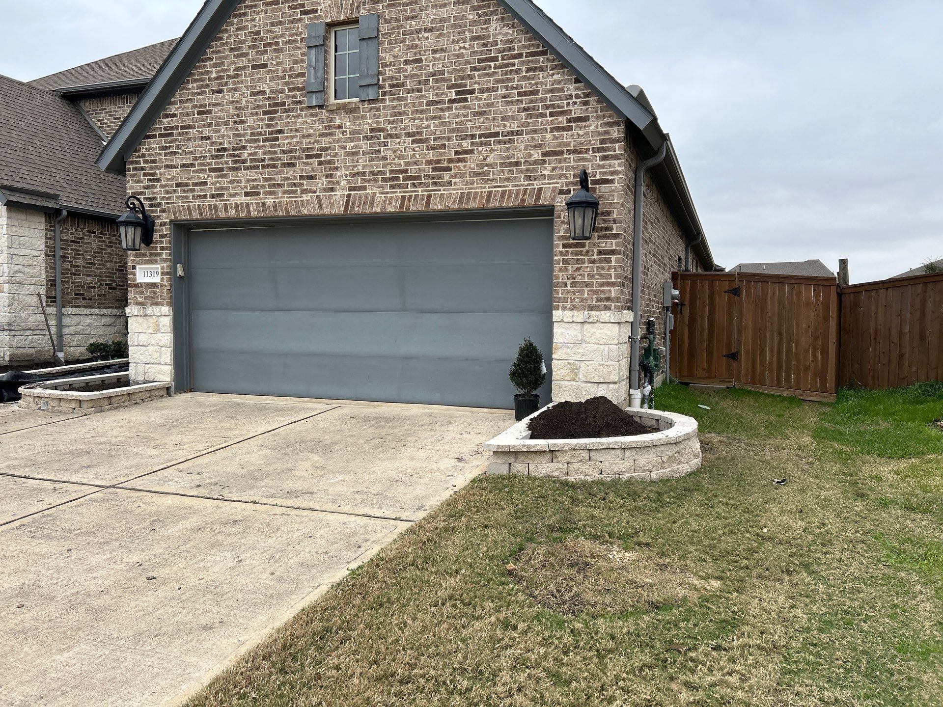 🌿✨ Darlene & Andrew’s Amazing Curb Appeal Transformation  Some projects are more than just landscaping—they’re a conversion of curb appeal from the ground up. For Darlene & Andrew, Alejandro and the Texas Urban Team designed and delivered a complete solution that reshaped their flower beds, solved drainage challenges, and gave new life to the sideyard.  💡 From planning to execution, every step was tailored to build both beauty and functionality:  🌸 Flower Beds, Reinvented  Demolition of old beds, plants, and mulch.  Fresh soil preparation, weed protection, and a brand-new retainer wall built with hand-cut stone and decorative caps.  Carefully selected plants and garden mix to ensure health and visual harmony.  💧 Drainage & Irrigation Upgrades  Outdated corrugated pipes replaced with PVC drainage lines to carry water safely away from the foundation.  New irrigation system combining drip lines and sprinklers—watering plants while keeping the house walls protected.  Sideyard drainage extended with catch basins and PVC piping to prevent water pooling and foundation stress.  🚶 Functional Sideyard with Walkway & Trash Area  Graded and leveled sideyard to manage runoff.  Installed a modern gravel and paver walkway for easy access.  Built a firm and tidy concrete-paver pad for trash containers—making the space both practical and polished.  🛠️ Stonework & Craftsmanship  Every stone in the retainer wall was cut, set, and secured by the team of handcrafters, ensuring a durable build that doubles as a design statement.  ✅ Outcome: Darlene & Andrew’s property now has better drainage, a clean and organized sideyard, and elegant new flower beds—all designed for long-term durability and lasting beauty.  📢 Before hiring anyone, review our portfolio. Our work speaks louder than words—each project is a blend of function, protection, and design crafted to last. by Texas Urban Elements
